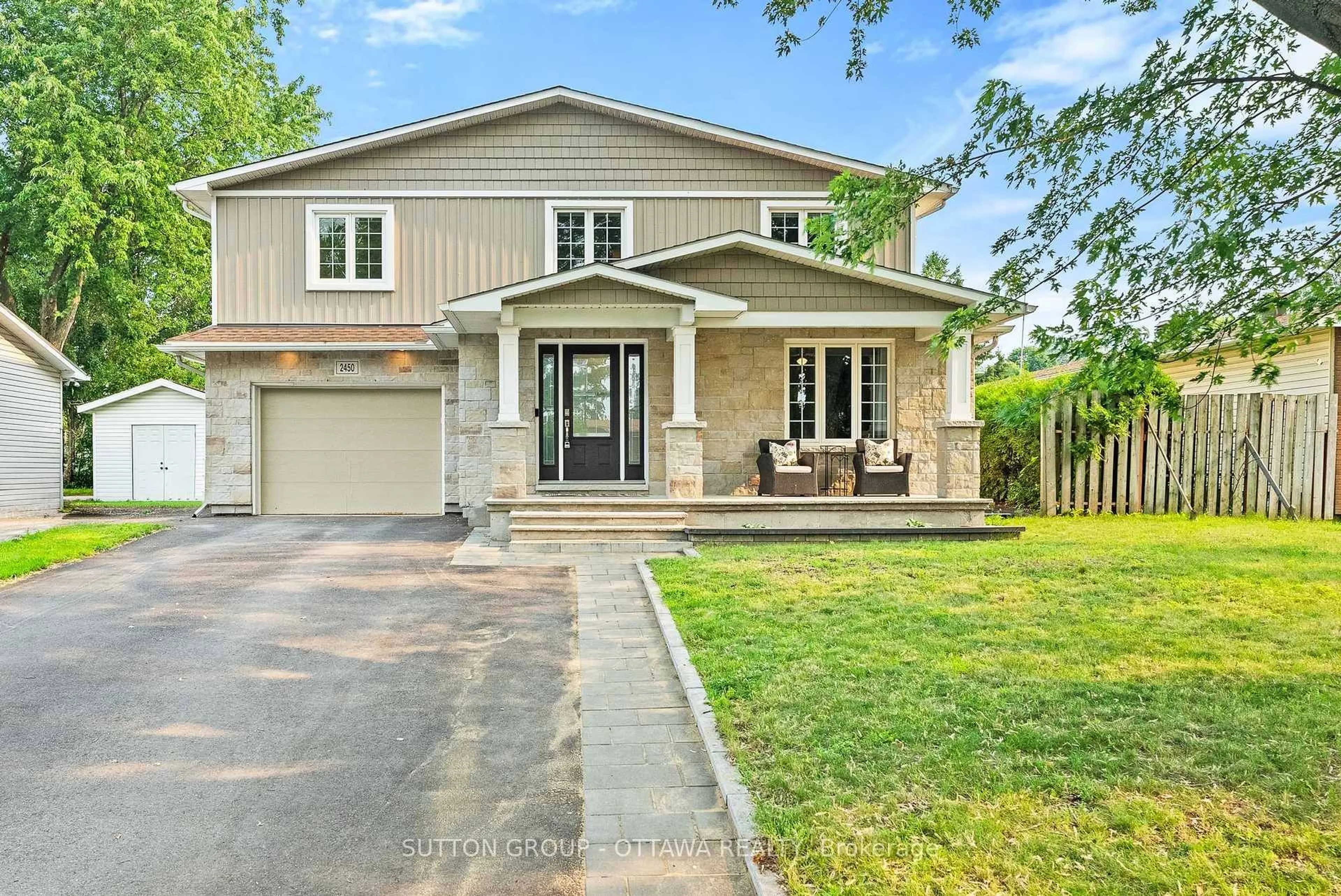 Home with brick exterior material, street for 2450 Blackstone Cres, Ottawa Ontario K1B 4H2