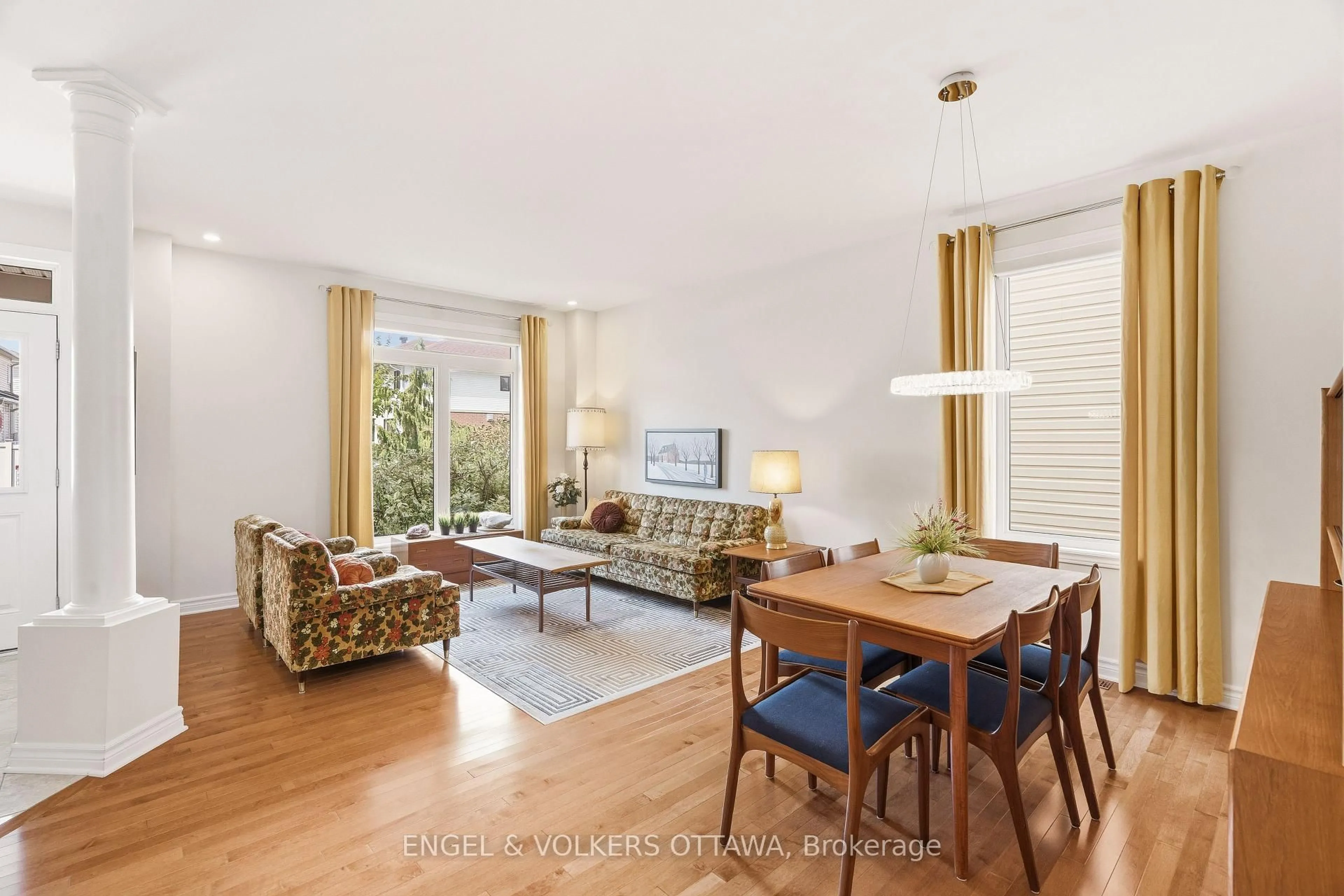 Living room with furniture, wood/laminate floor for 502 Caracole Way, Ottawa Ontario K4A 0W3
