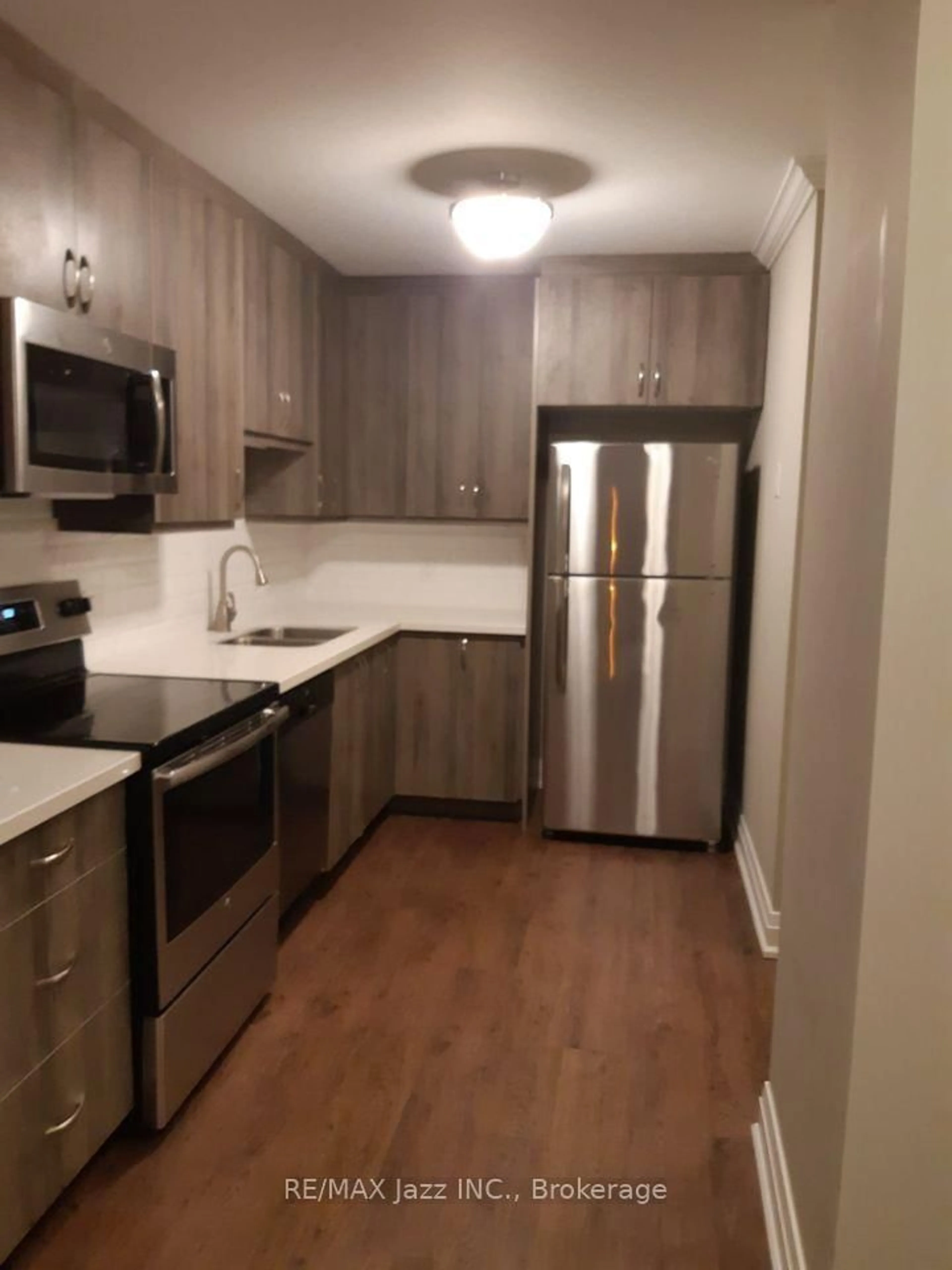 Standard kitchen, wood/laminate floor for 26 Spencer St #106, Cobourg Ontario K9A 1C2