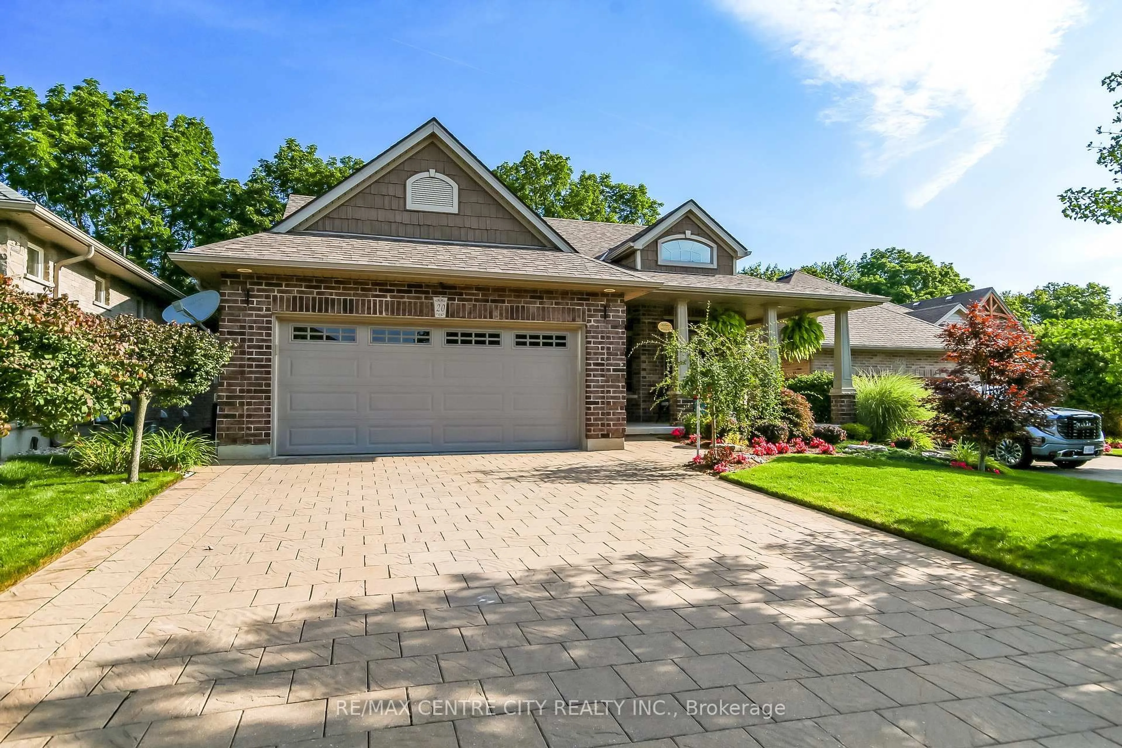 Home with brick exterior material, street for 20 Ensley Pl, Central Elgin Ontario N5L 0A1