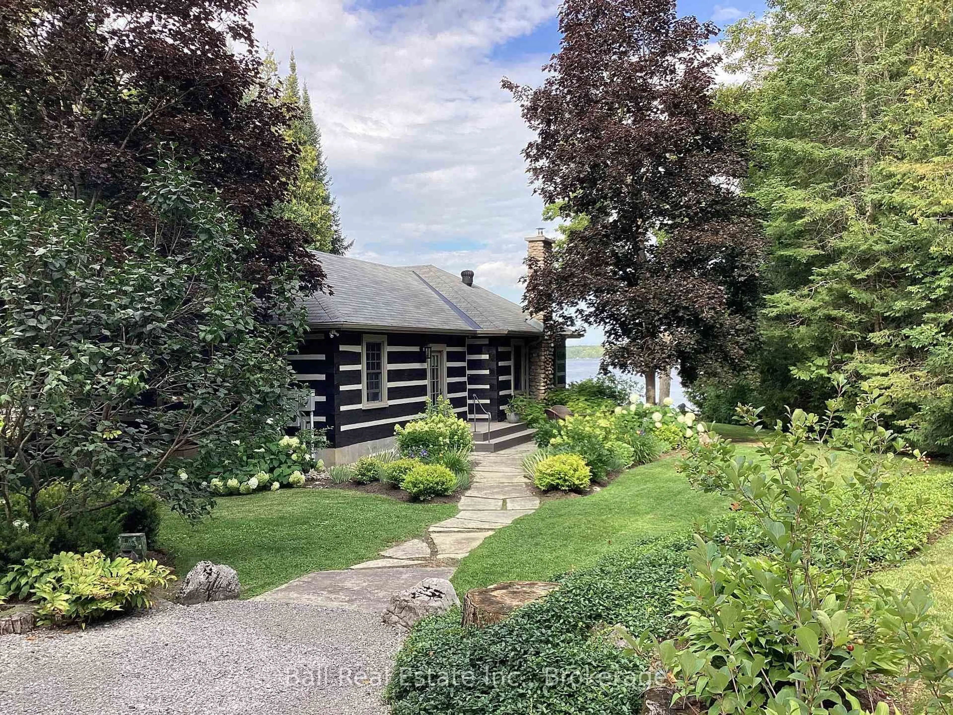 A pic from outside/outdoor area/front of a property/back of a property/a pic from drone, water/lake/river/ocean view for 2933 Ayotte's Point Lane, Selwyn Ontario K0L 2H0