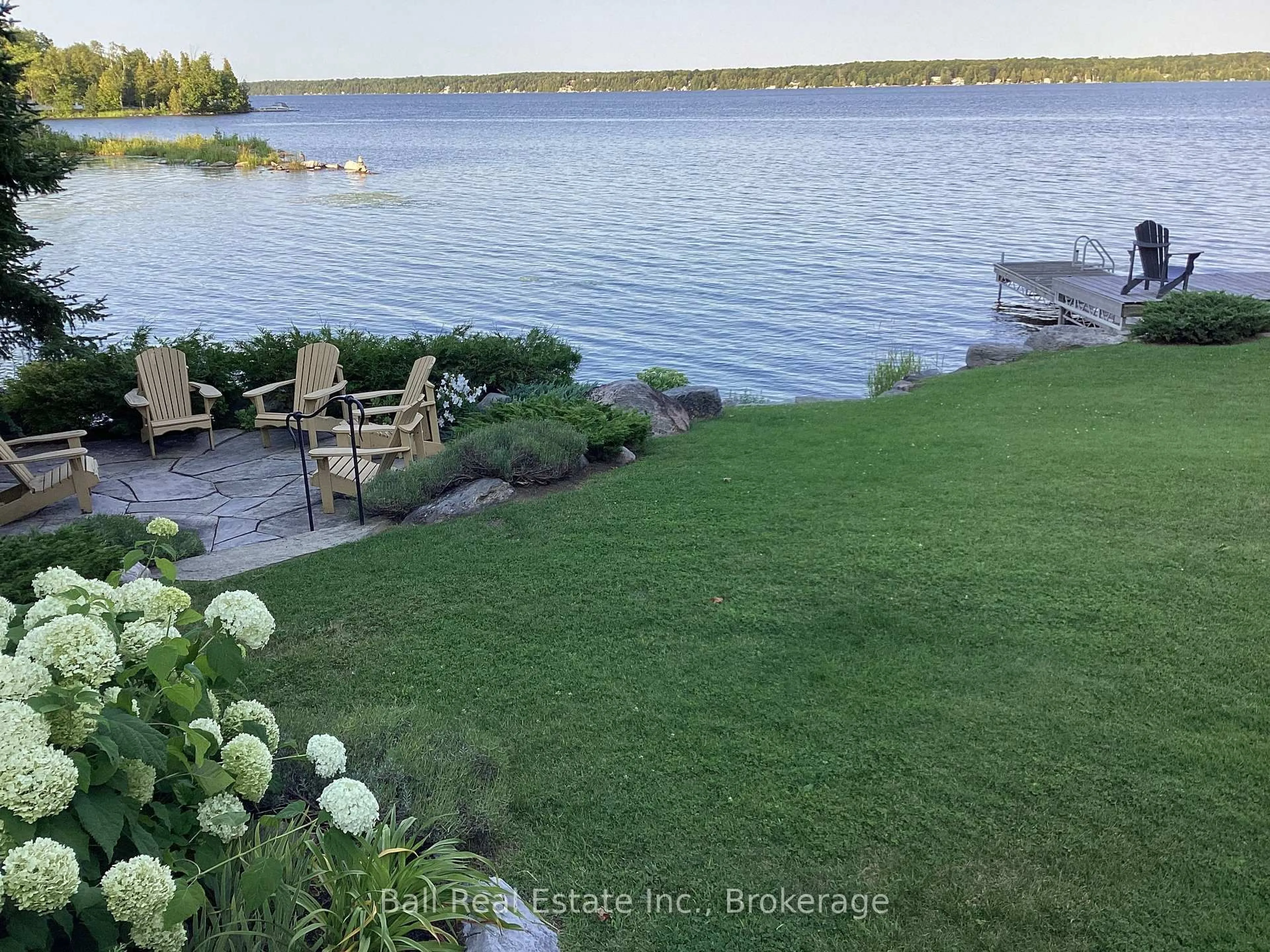 A pic from outside/outdoor area/front of a property/back of a property/a pic from drone, water/lake/river/ocean view for 2933 Ayotte's Point Lane, Selwyn Ontario K0L 2H0