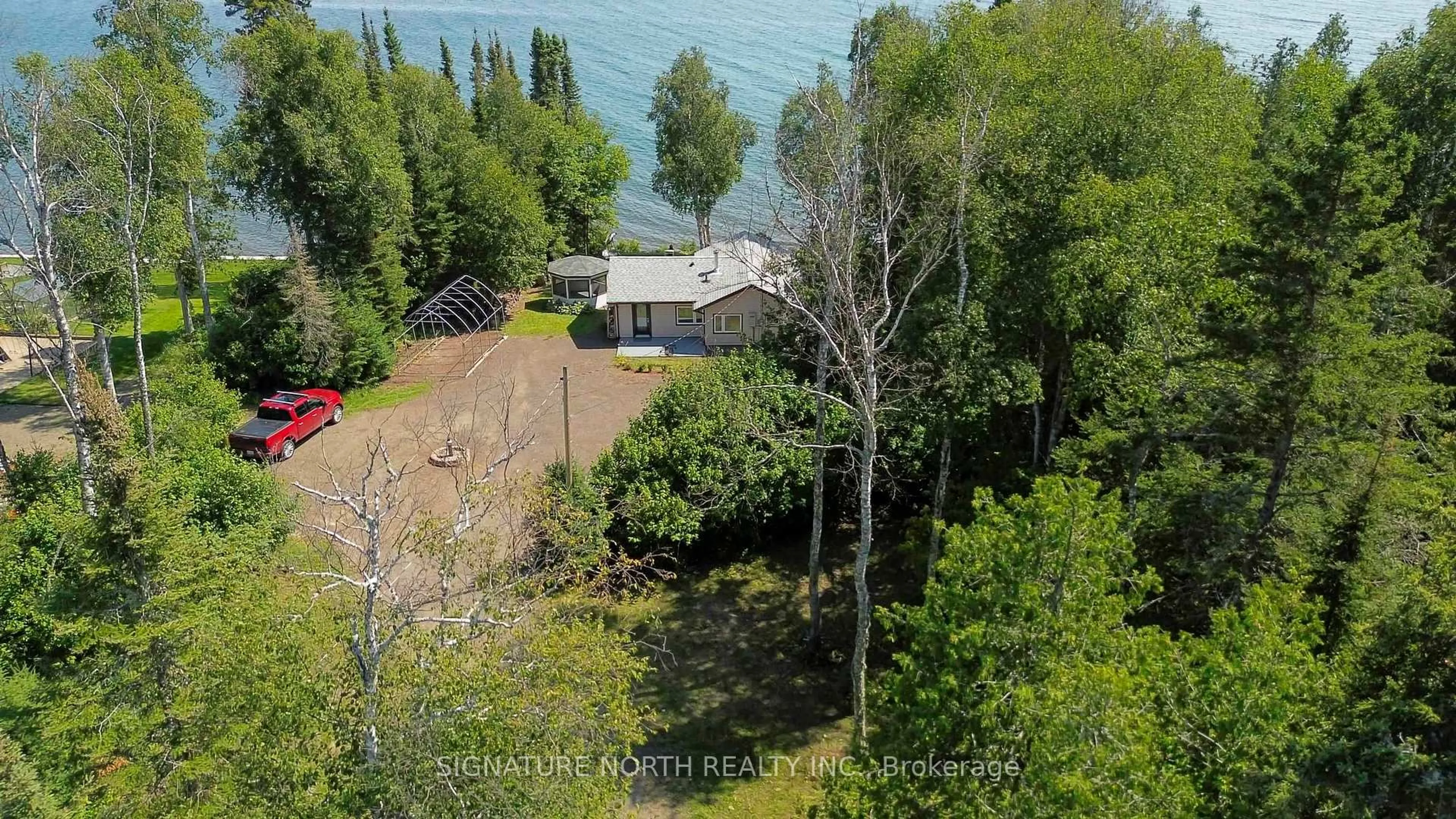 A pic from outside/outdoor area/front of a property/back of a property/a pic from drone, water/lake/river/ocean view for 2427 Scott Dr, Shuniah Ontario P7A 0Y7