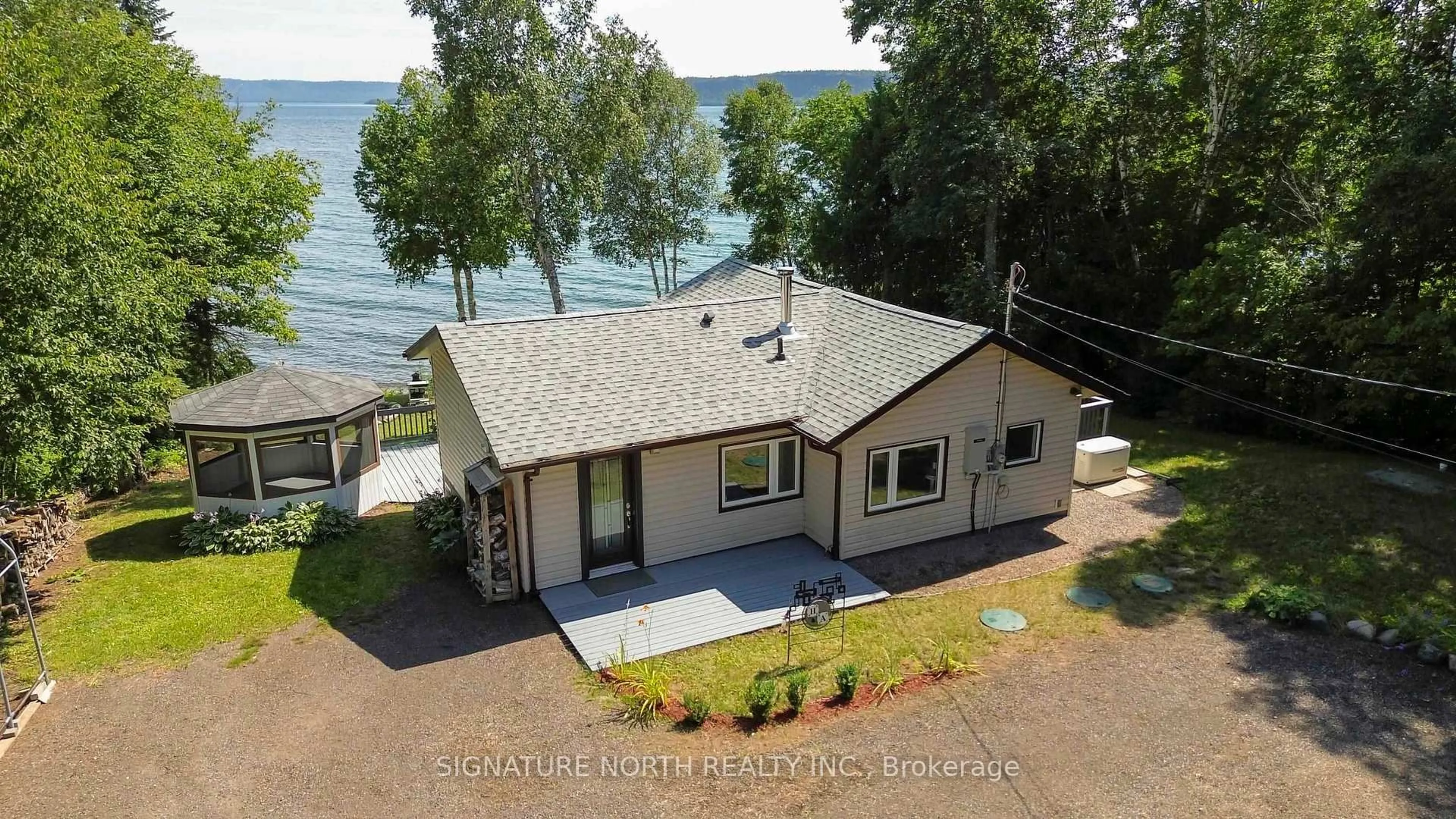 A pic from outside/outdoor area/front of a property/back of a property/a pic from drone, water/lake/river/ocean view for 2427 Scott Dr, Shuniah Ontario P7A 0Y7