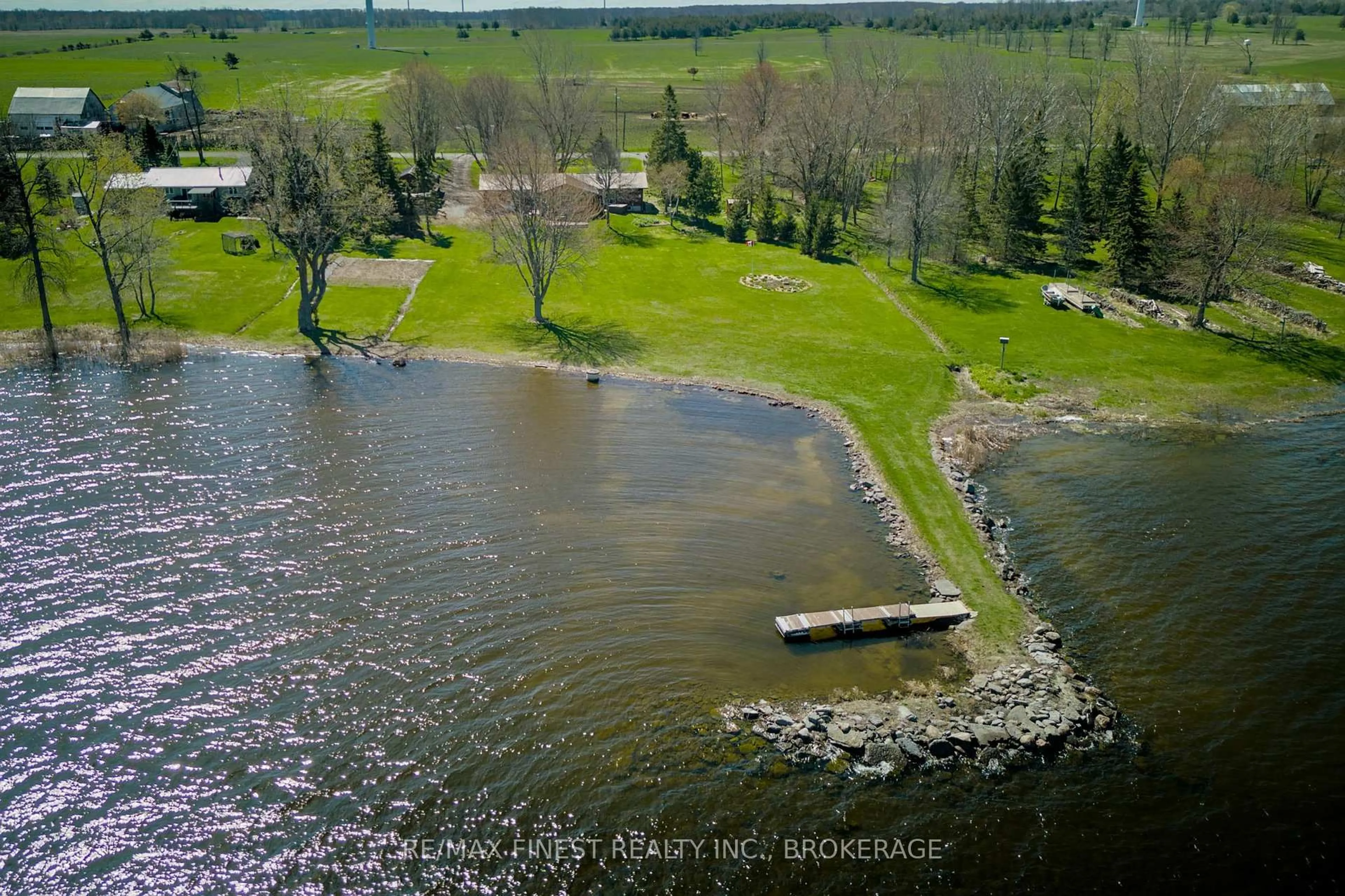 A pic from outside/outdoor area/front of a property/back of a property/a pic from drone, water/lake/river/ocean view for 10930 Front Rd, Stella Ontario K0H 2S0