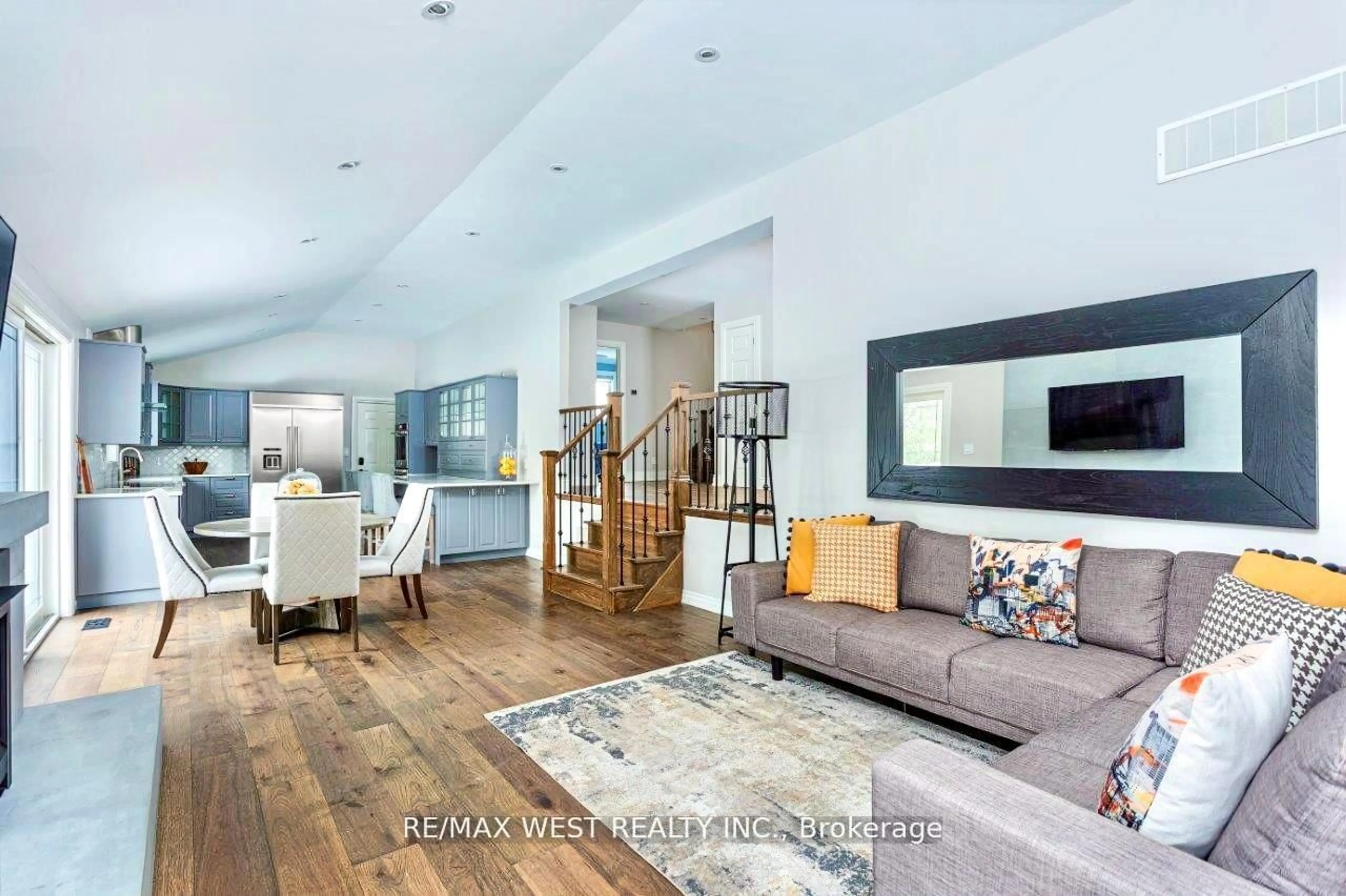 Living room with furniture, wood/laminate floor for 26 Hostein Dr, Hamilton Ontario L9G 2S5