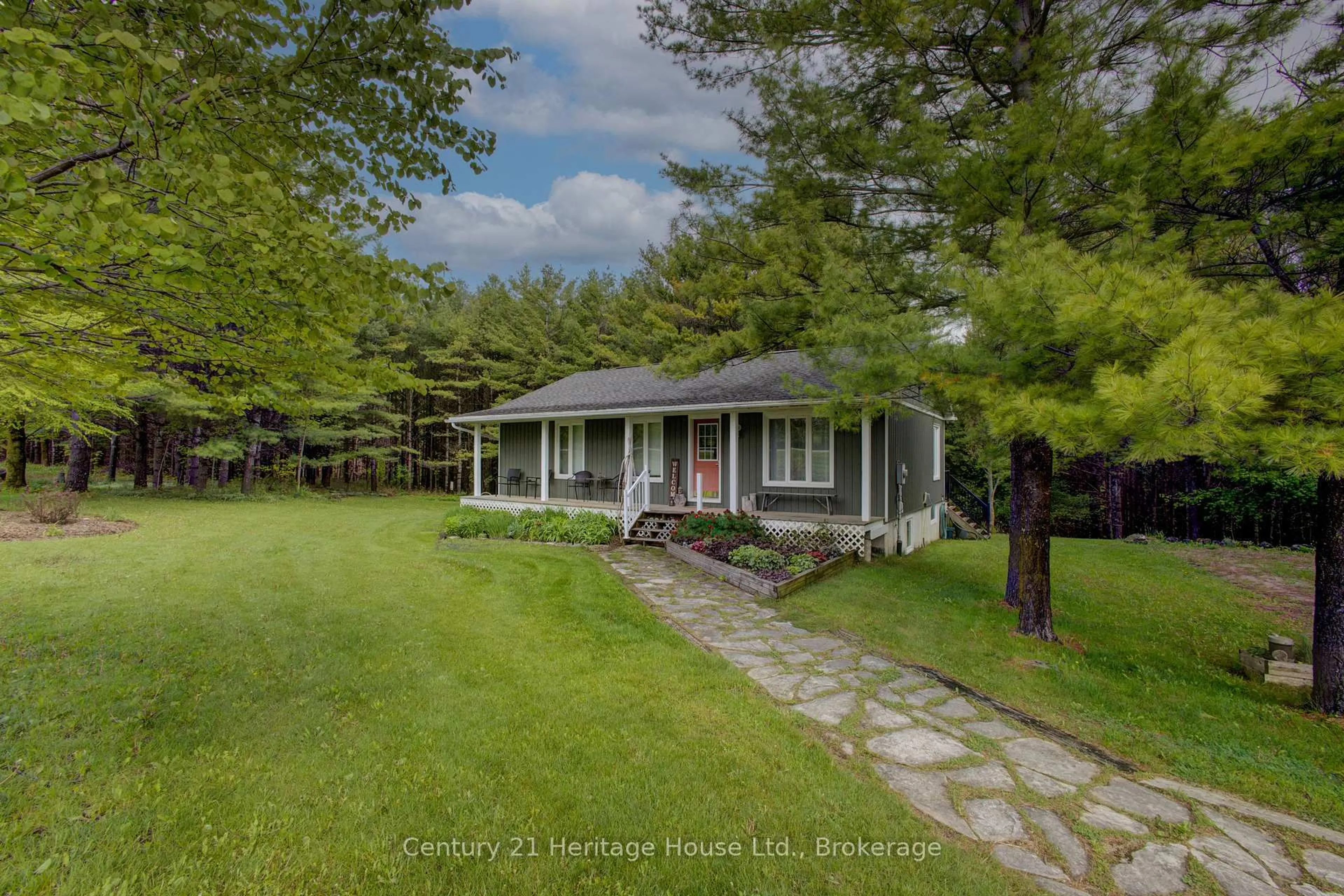 A pic from outside/outdoor area/front of a property/back of a property/a pic from drone, street for 262845 Varney Rd, West Grey Ontario N0G 1R0