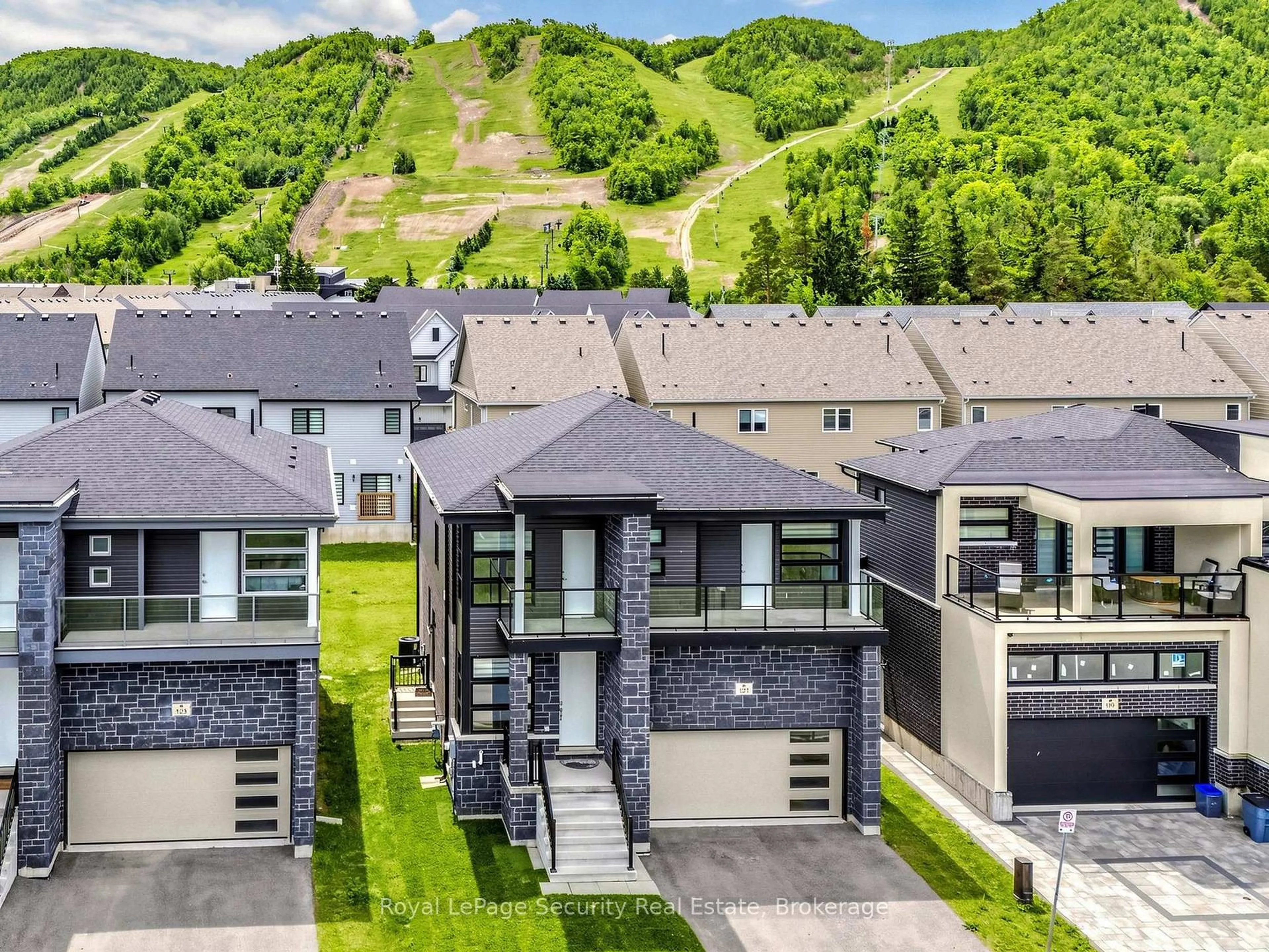 A pic from outside/outdoor area/front of a property/back of a property/a pic from drone, mountain view for 121 Sebastian St #86, Blue Mountains Ontario N0H 1J0