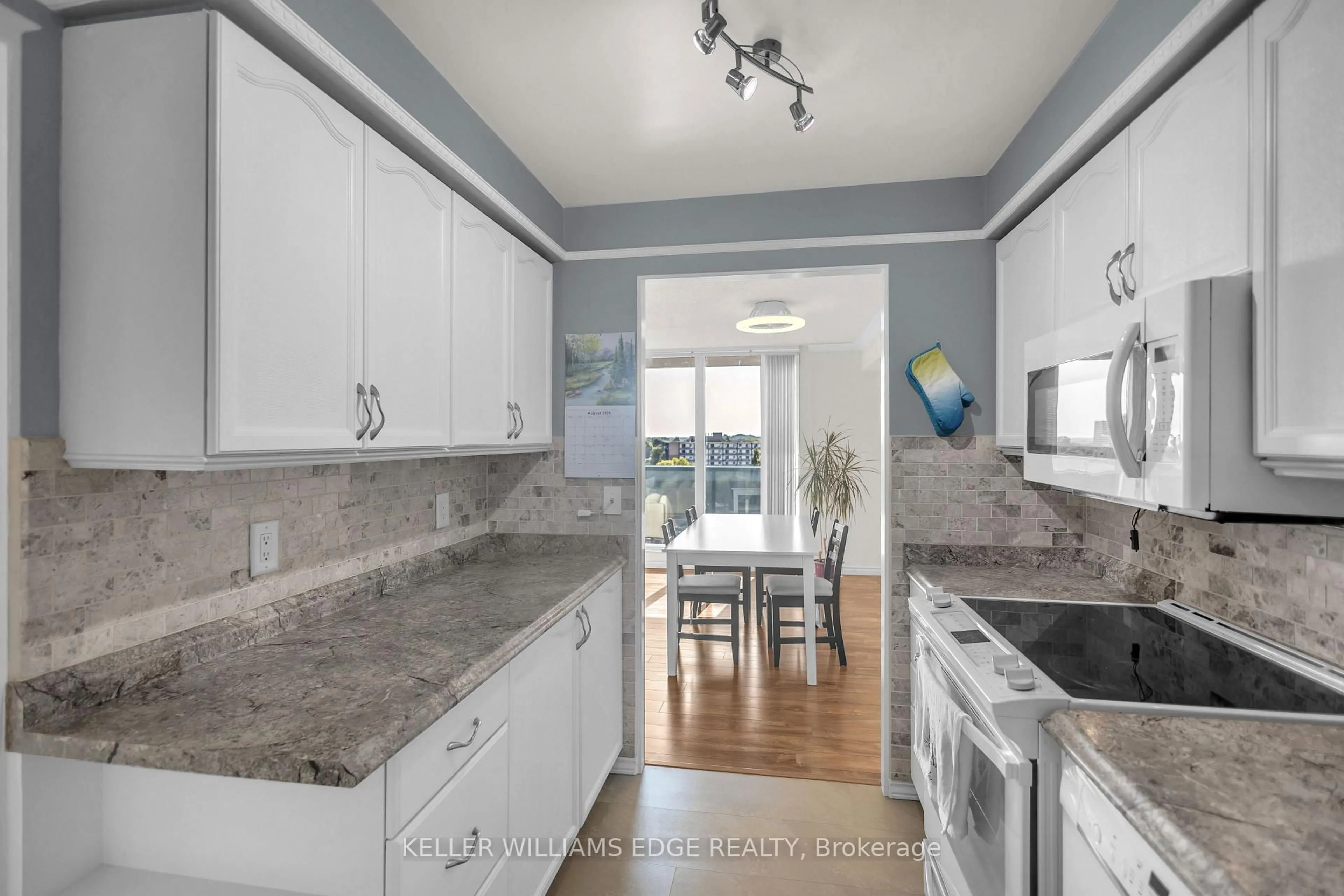 Open concept kitchen, ceramic/tile floor for 9 Bonheur Crt #815, Brantford Ontario N3P 1Z5