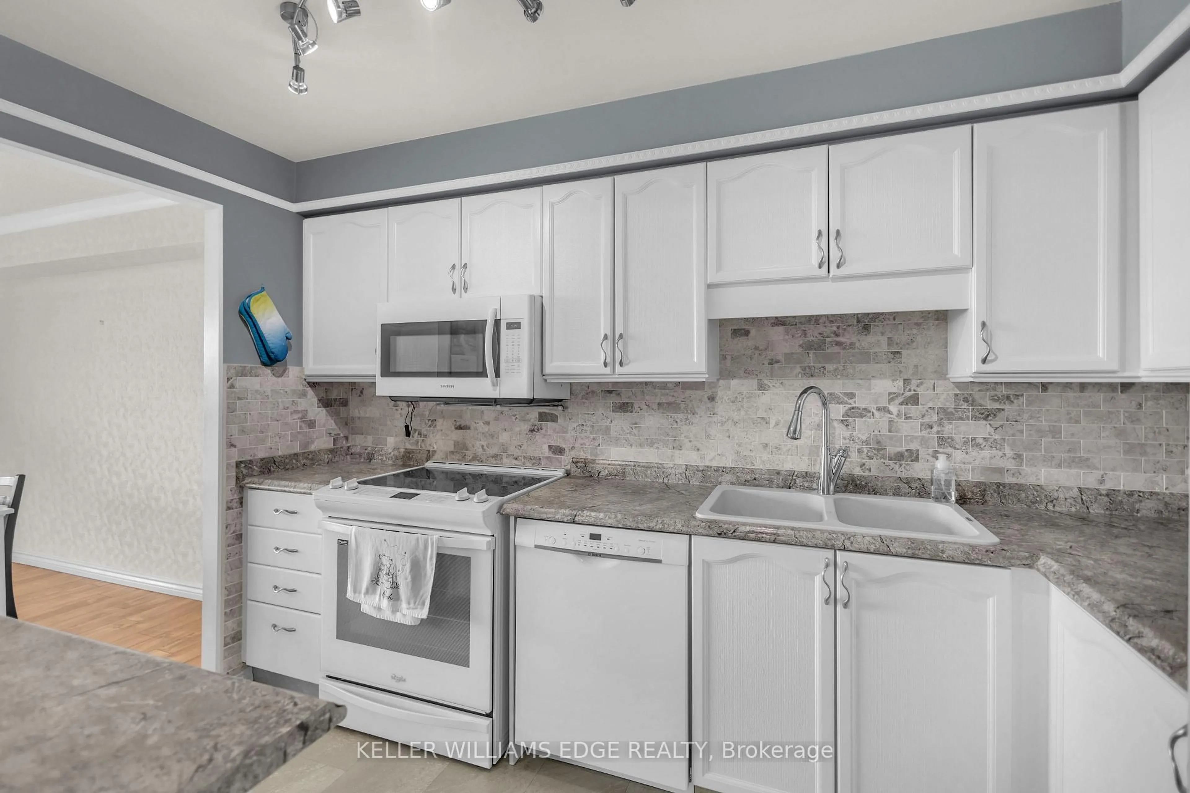 Standard kitchen, ceramic/tile floor for 9 Bonheur Crt #815, Brantford Ontario N3P 1Z5