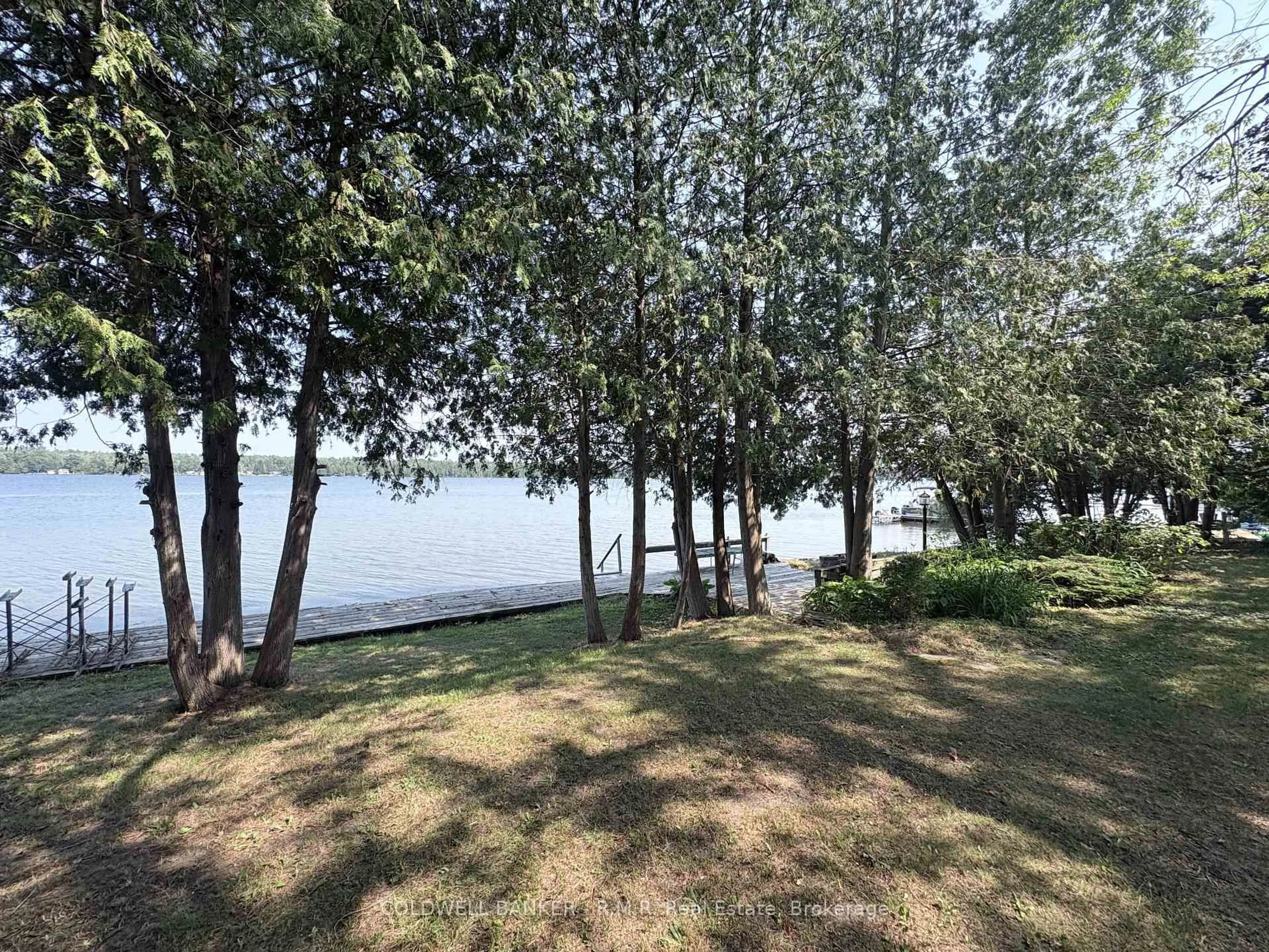 A pic from outside/outdoor area/front of a property/back of a property/a pic from drone, water/lake/river/ocean view for 60 Pinewood Blvd, Kawartha Lakes Ontario K0M 2T0
