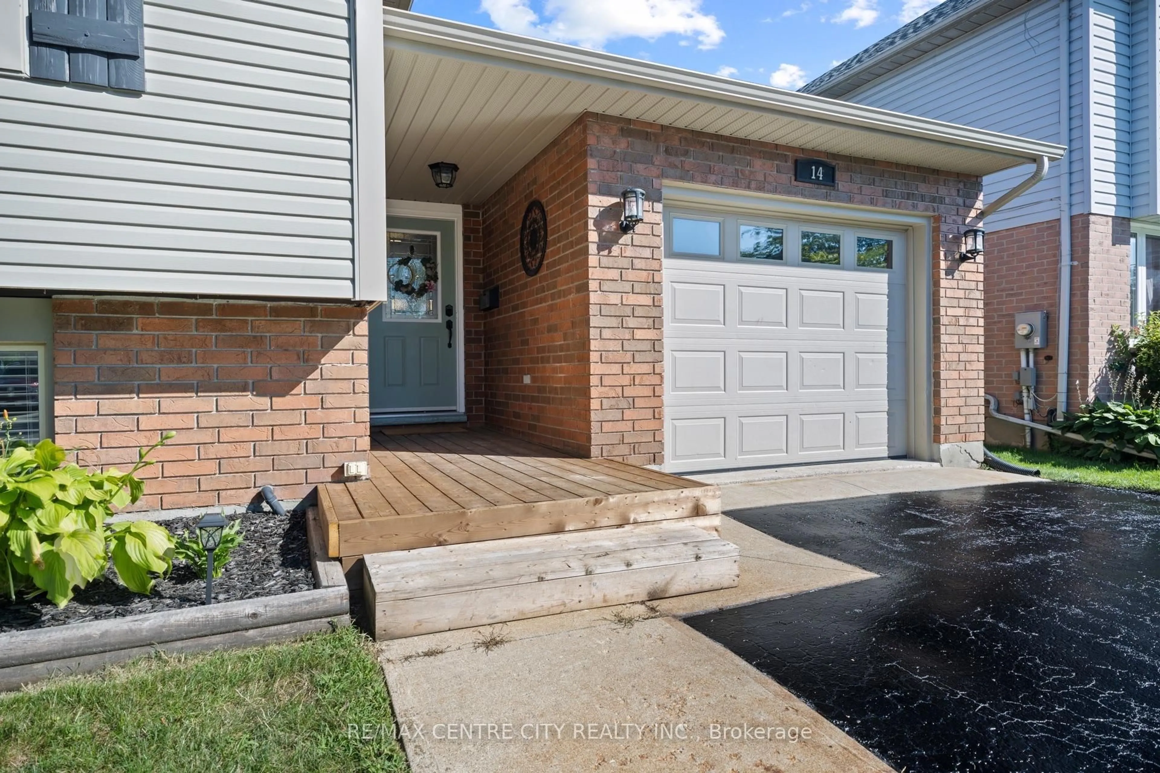 Home with brick exterior material, street for 14 Stokes Rd, St. Thomas Ontario N5R 5V7