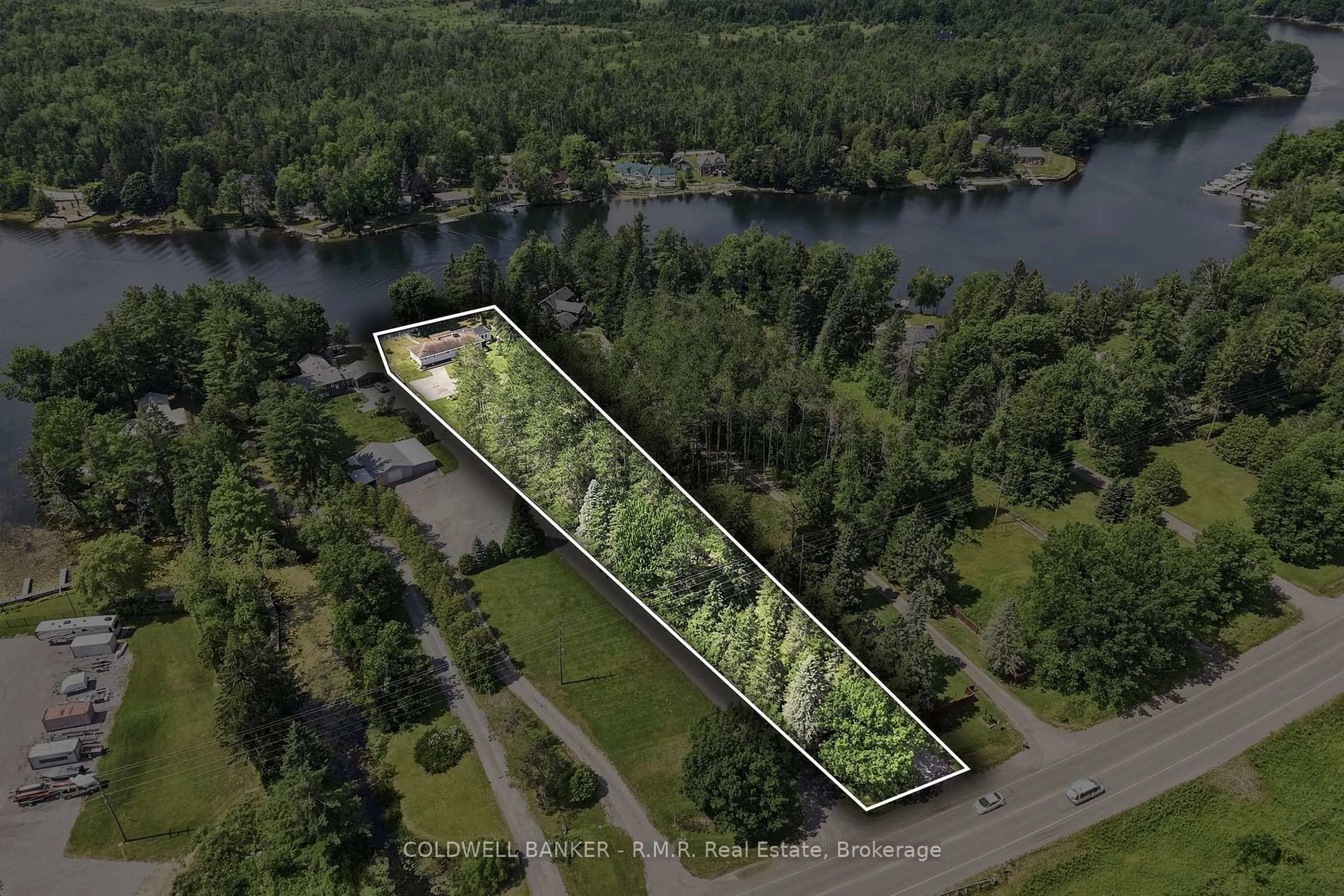 A pic from outside/outdoor area/front of a property/back of a property/a pic from drone, water/lake/river/ocean view for 33 Portage Rd, Kawartha Lakes Ontario K0M 2T0