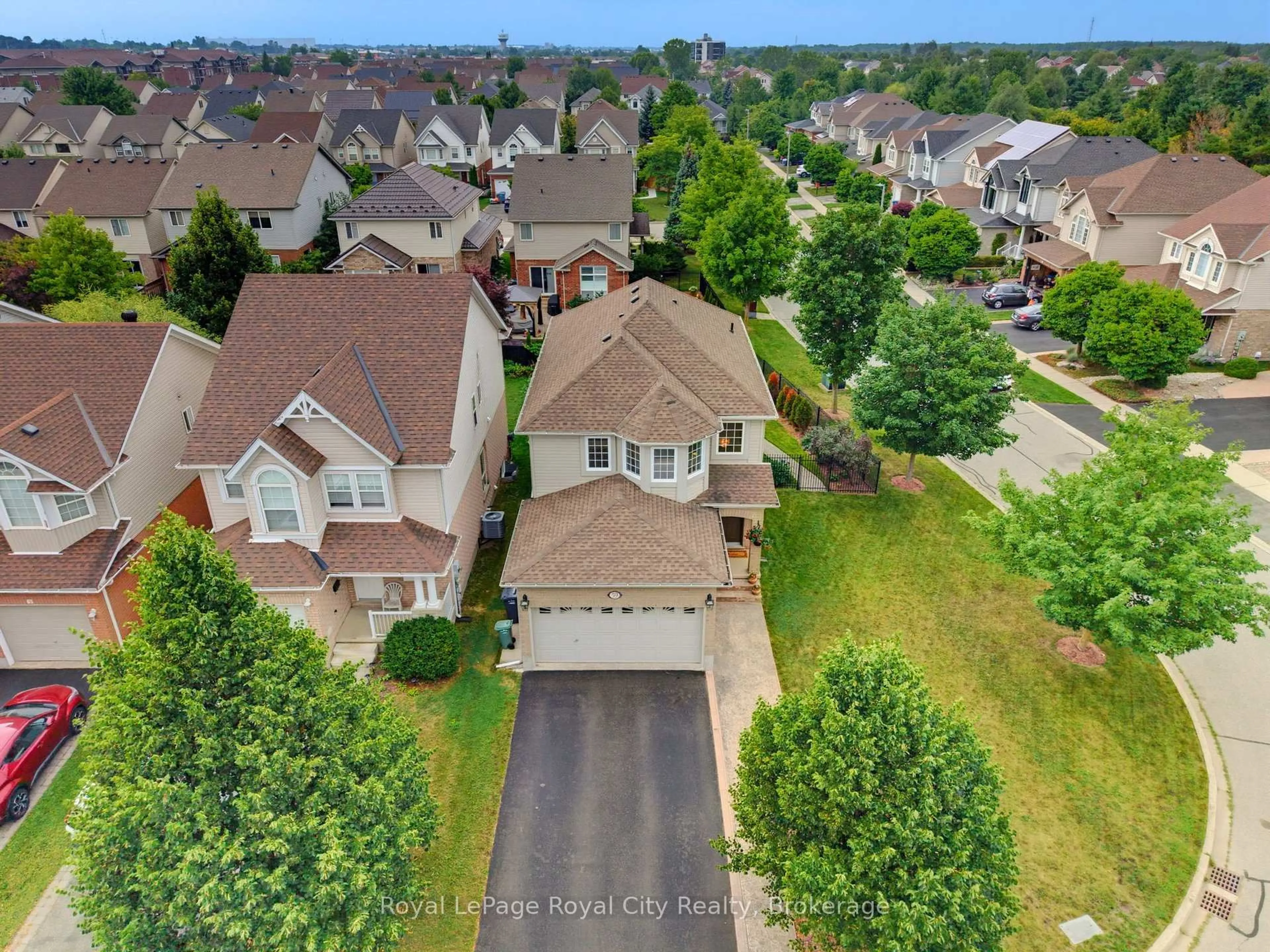 A pic from outside/outdoor area/front of a property/back of a property/a pic from drone, unknown for 59 Lynch Circ, Guelph Ontario N1L 1R9