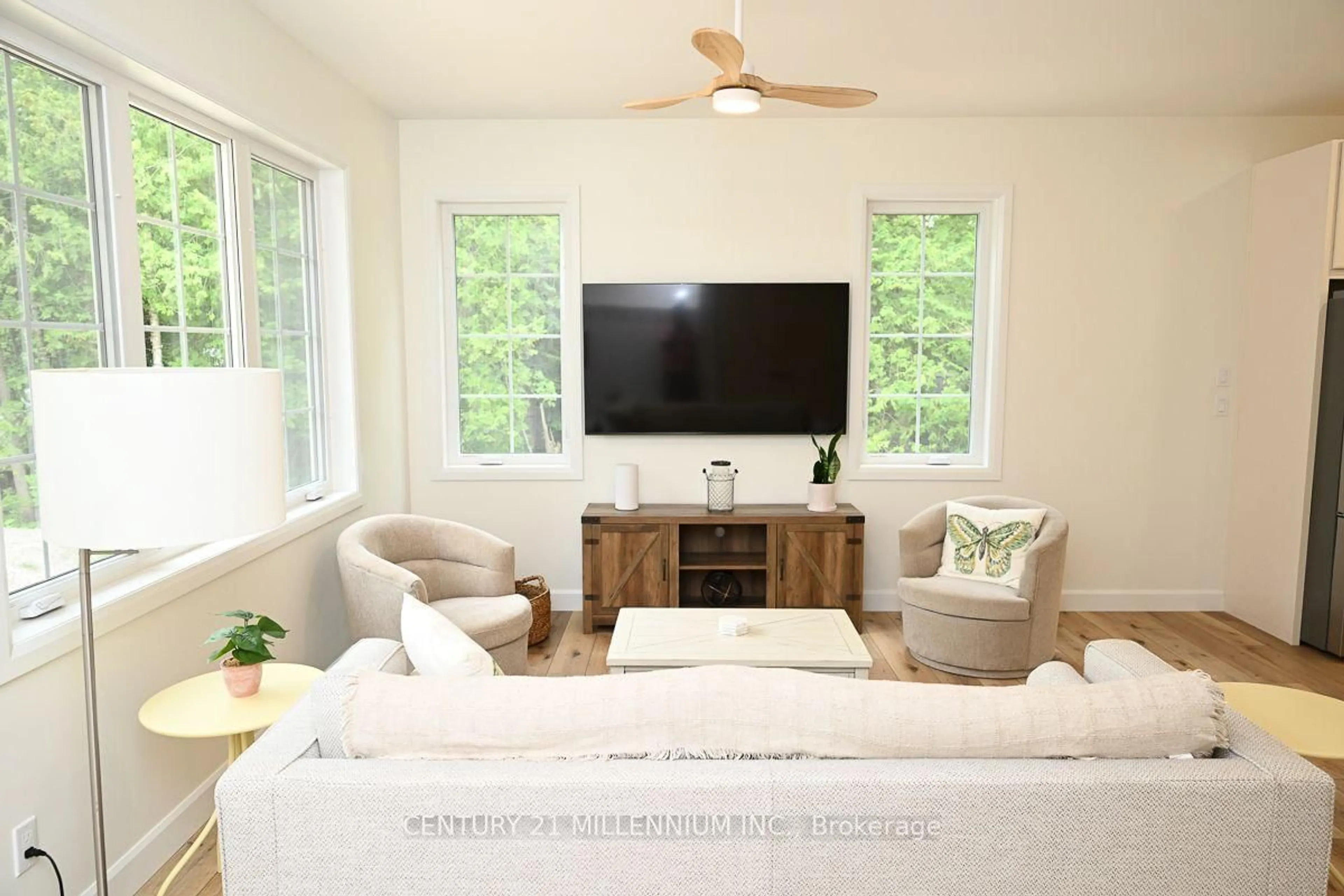 Living room with furniture, wood/laminate floor for 34 Rolling Hills Dr, South Bruce Peninsula Ontario N0H 2T0