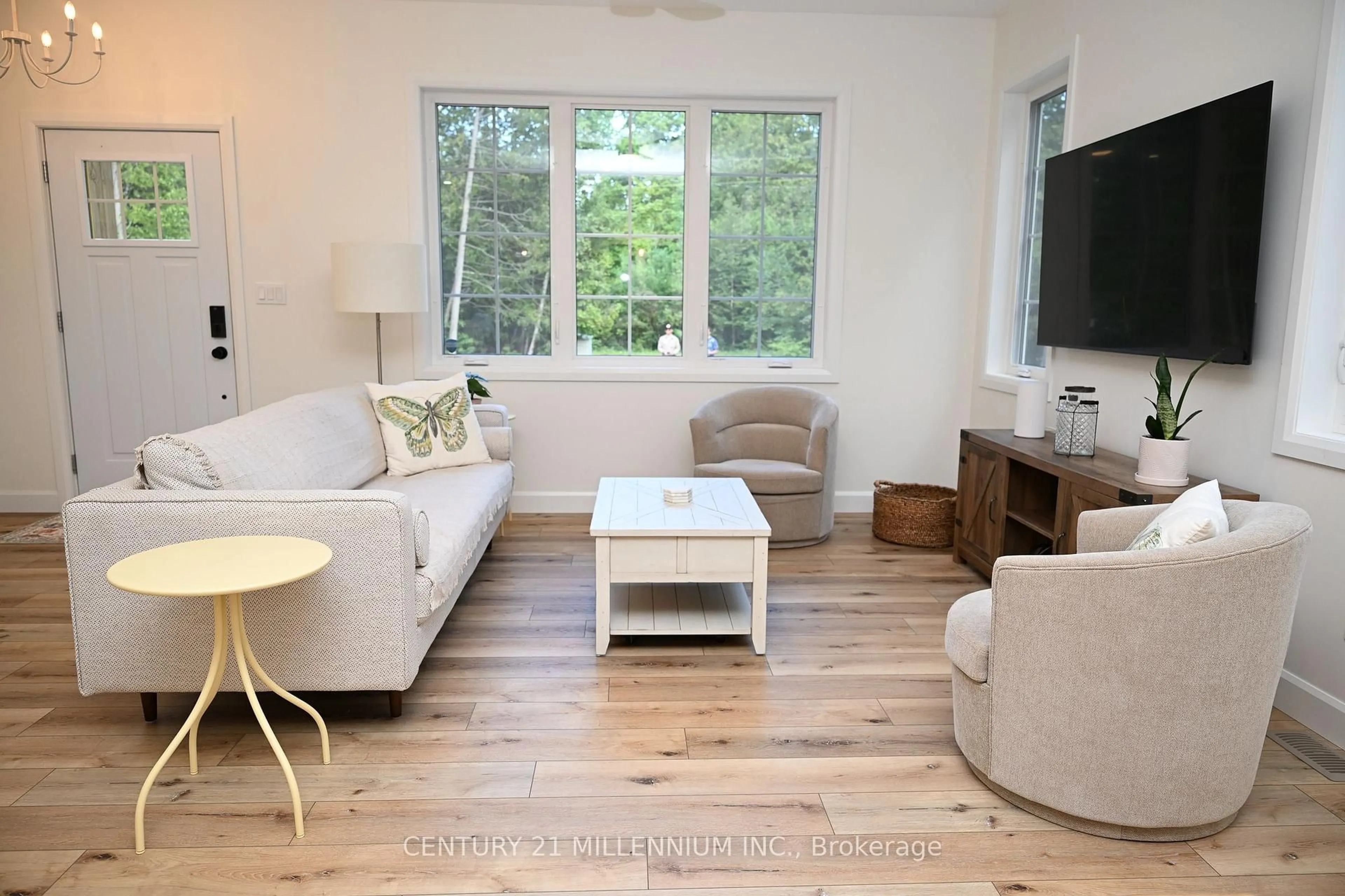 Living room with furniture, wood/laminate floor for 34 Rolling Hills Dr, South Bruce Peninsula Ontario N0H 2T0