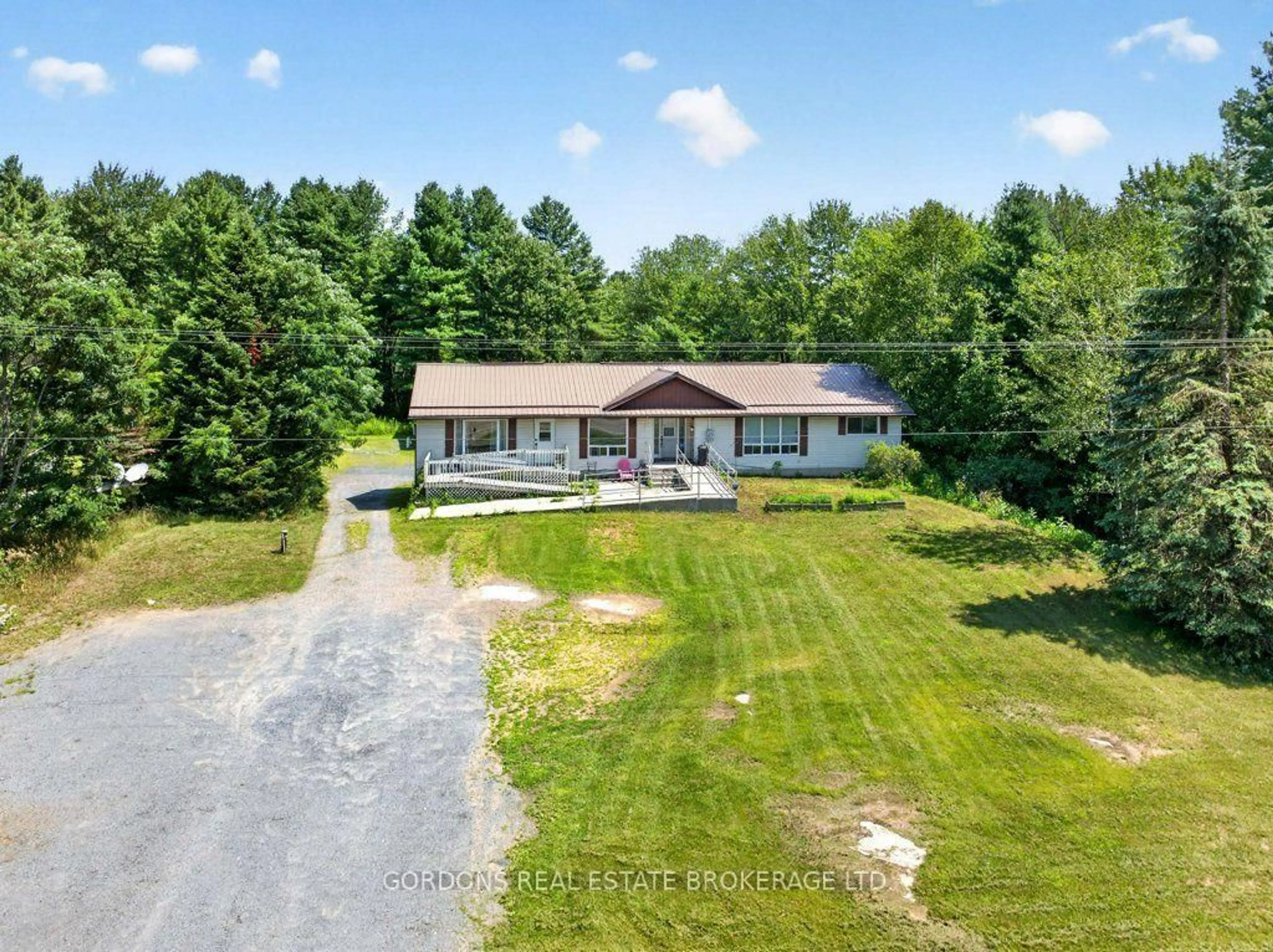 A pic from outside/outdoor area/front of a property/back of a property/a pic from drone, unknown for 11703 Highway 41, Kaladar Ontario K0H 1Z0