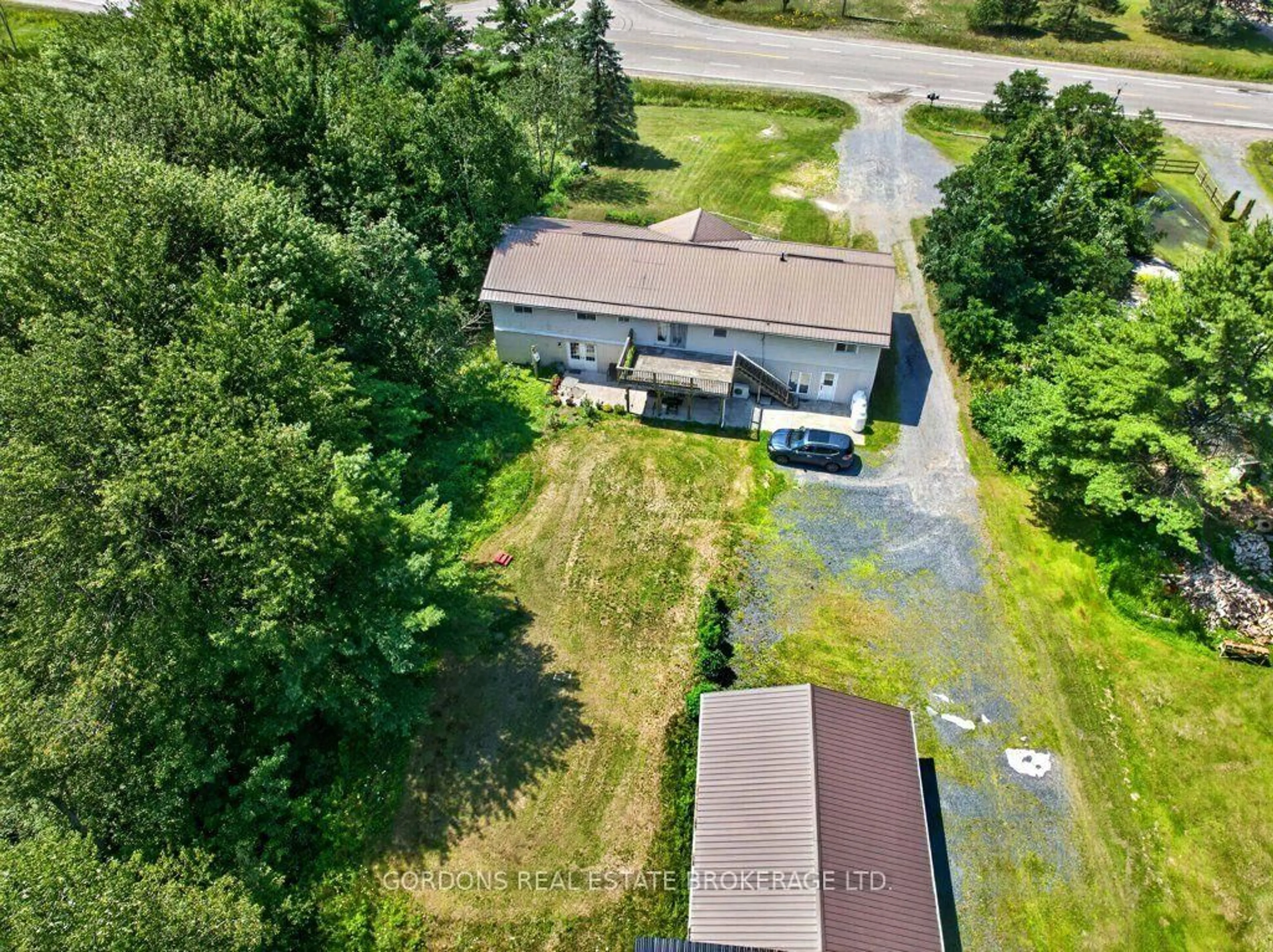 A pic from outside/outdoor area/front of a property/back of a property/a pic from drone, unknown for 11703 Highway 41, Kaladar Ontario K0H 1Z0