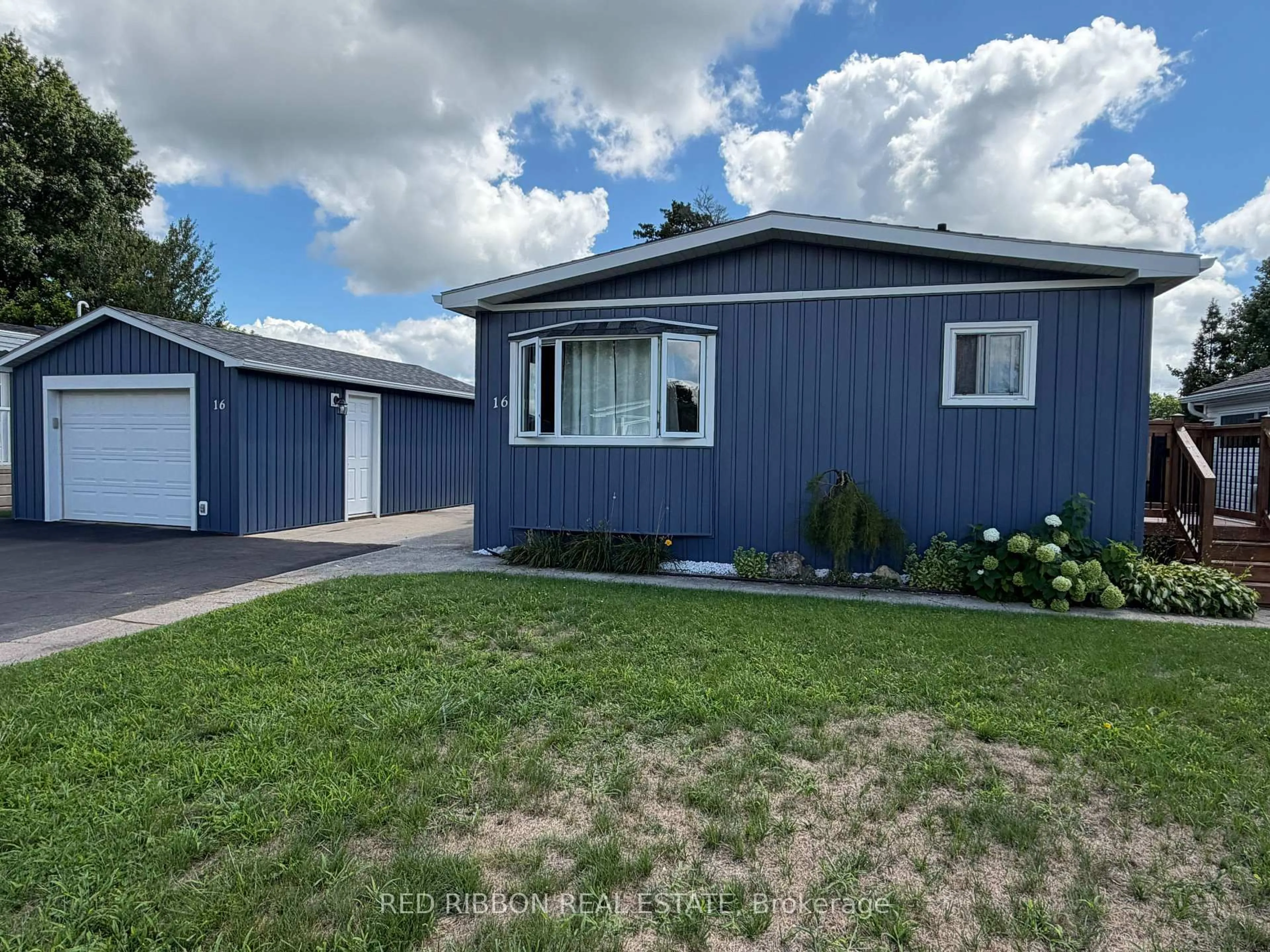 Home with vinyl exterior material, street for 16 Velma St, Strathroy-Caradoc Ontario N7G 3L3