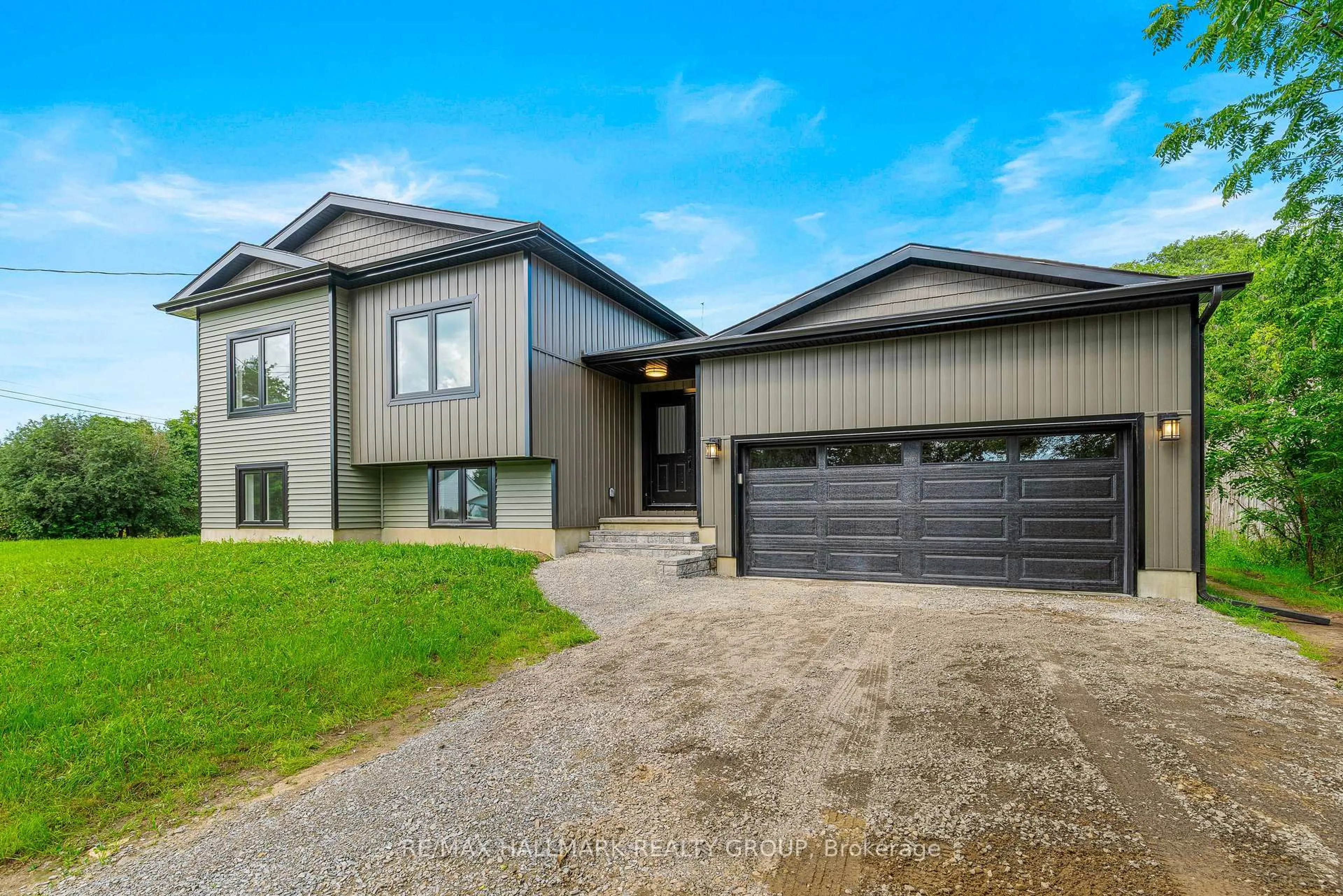 Home with vinyl exterior material, street for 9303 Greenbush Lane, Elizabethtown-Kitley Ontario K0E 1A0
