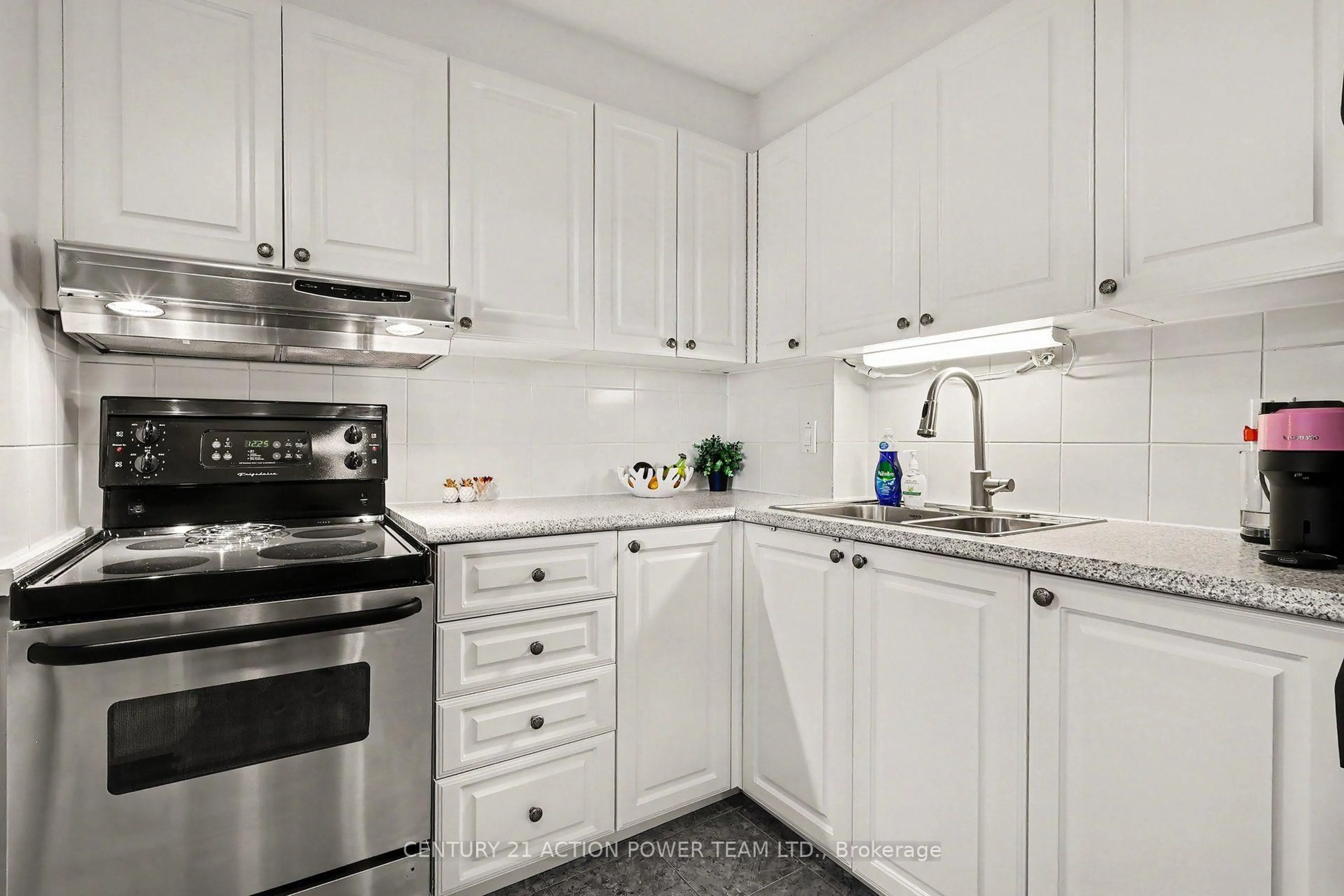 Standard kitchen, ceramic/tile floor for 915 Elmsmere Rd #1006, Ottawa Ontario K1J 8H8