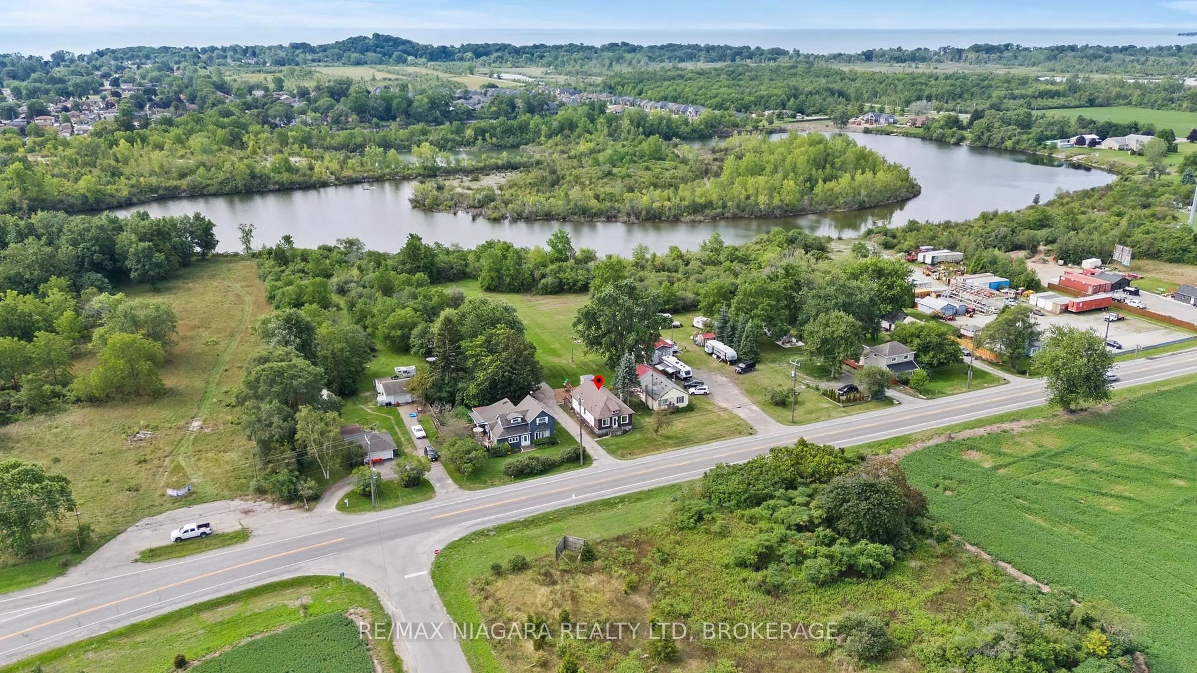 A pic from outside/outdoor area/front of a property/back of a property/a pic from drone, water/lake/river/ocean view for 702 Main St, Port Colborne Ontario L3K 5V4