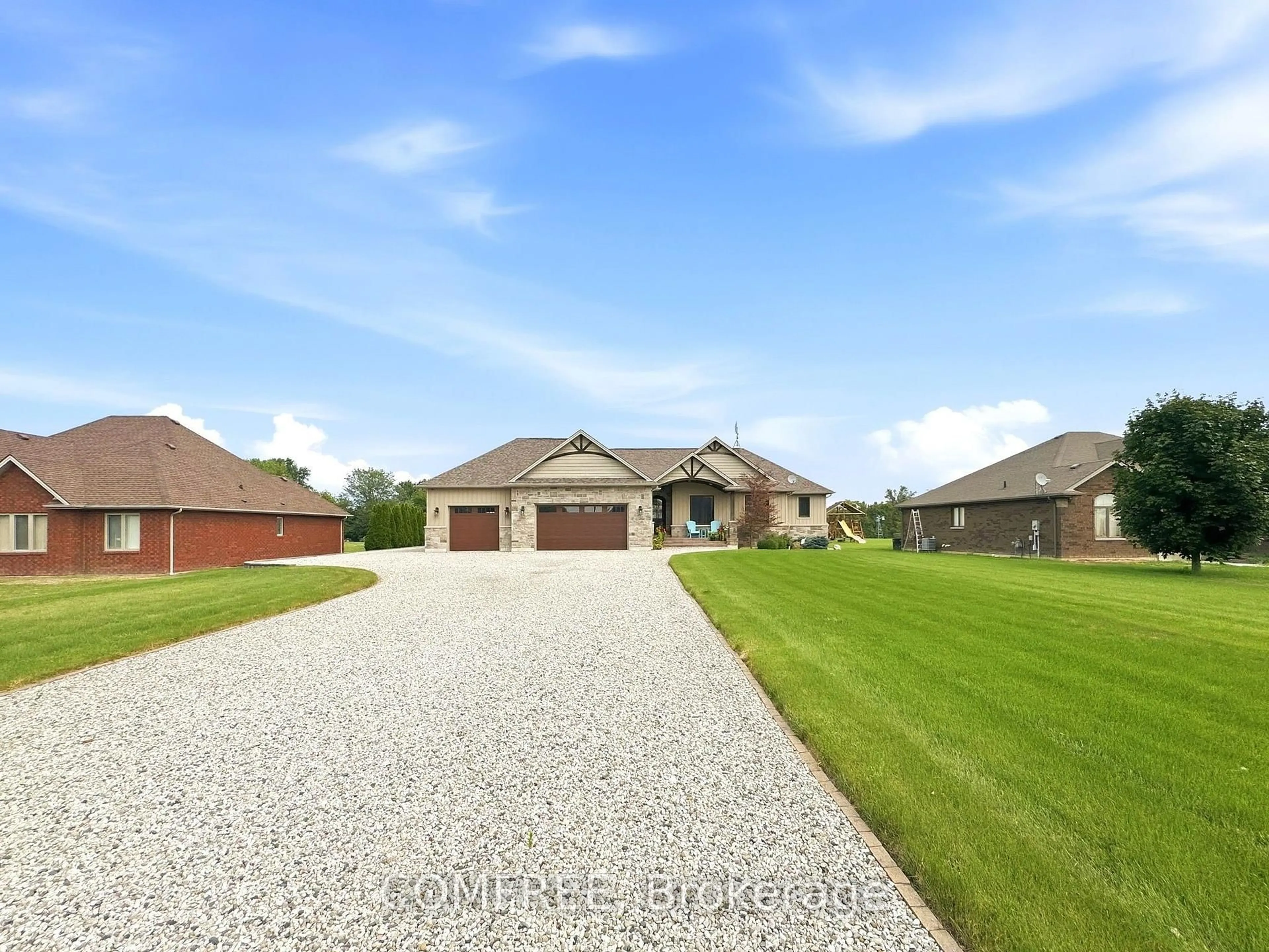 A pic from outside/outdoor area/front of a property/back of a property/a pic from drone, street for 663 County 2 Rd, Lakeshore Ontario N8L 1K3
