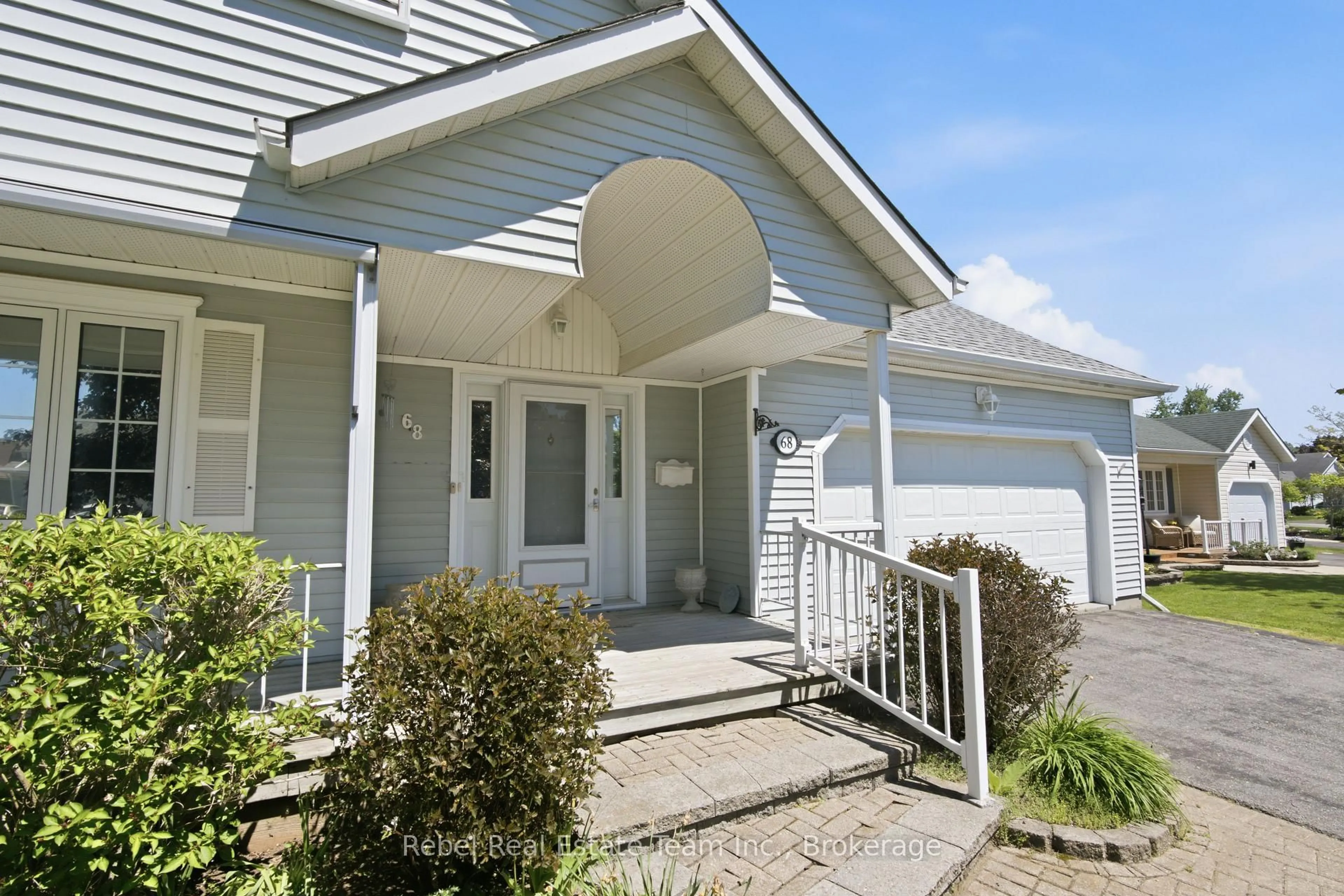Home with vinyl exterior material, street for 68 Mills Rd, Brighton Ontario K0K 1H0
