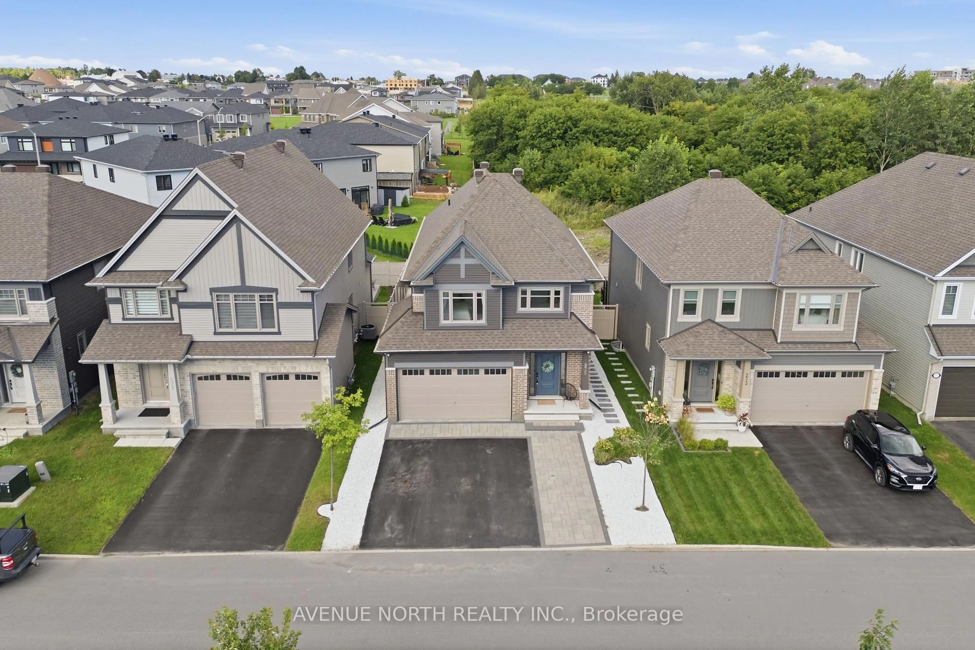 A pic from outside/outdoor area/front of a property/back of a property/a pic from drone, street for 275 Trollius Way, Ottawa Ontario K1T 0S2