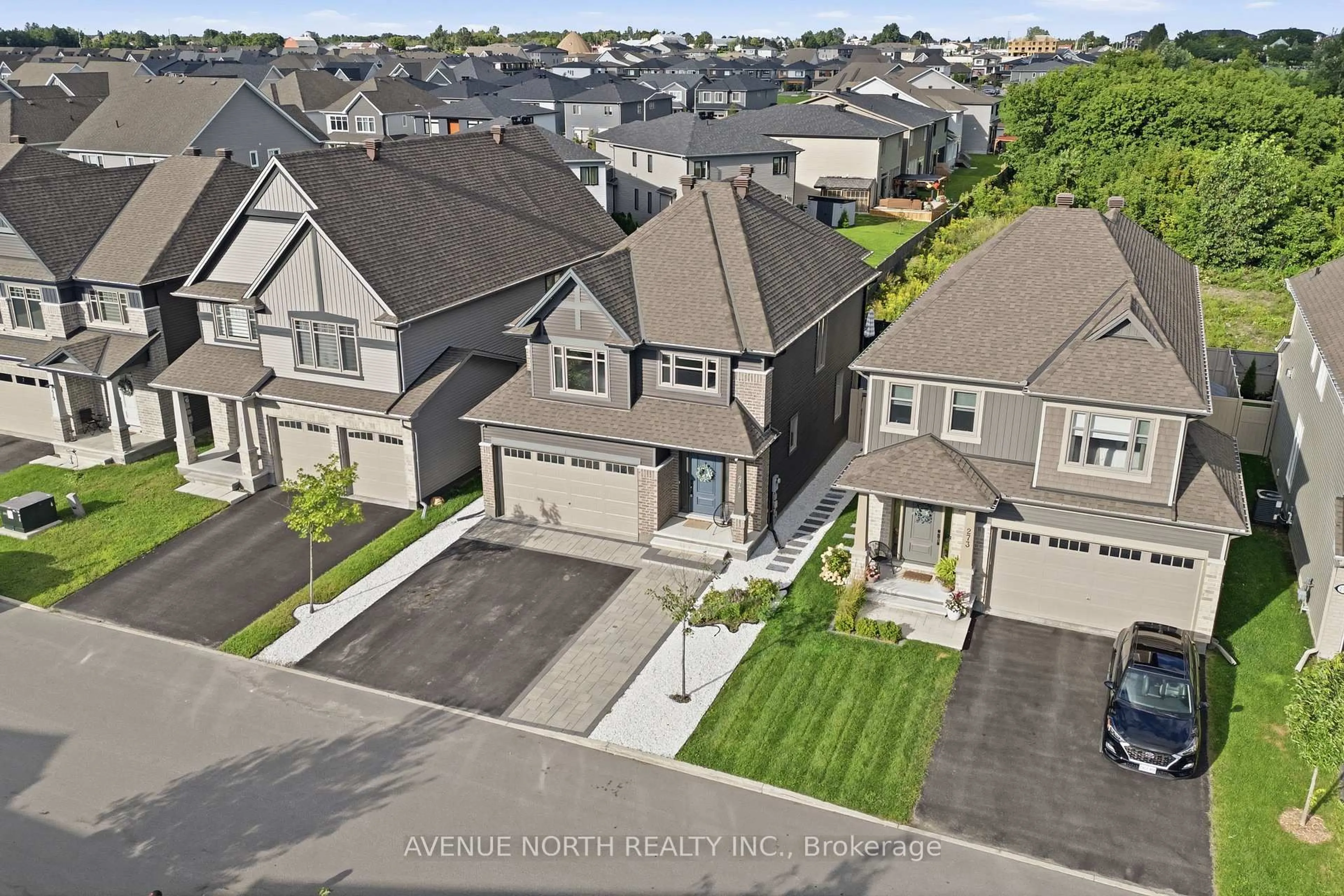 A pic from outside/outdoor area/front of a property/back of a property/a pic from drone, street for 275 Trollius Way, Ottawa Ontario K1T 0S2
