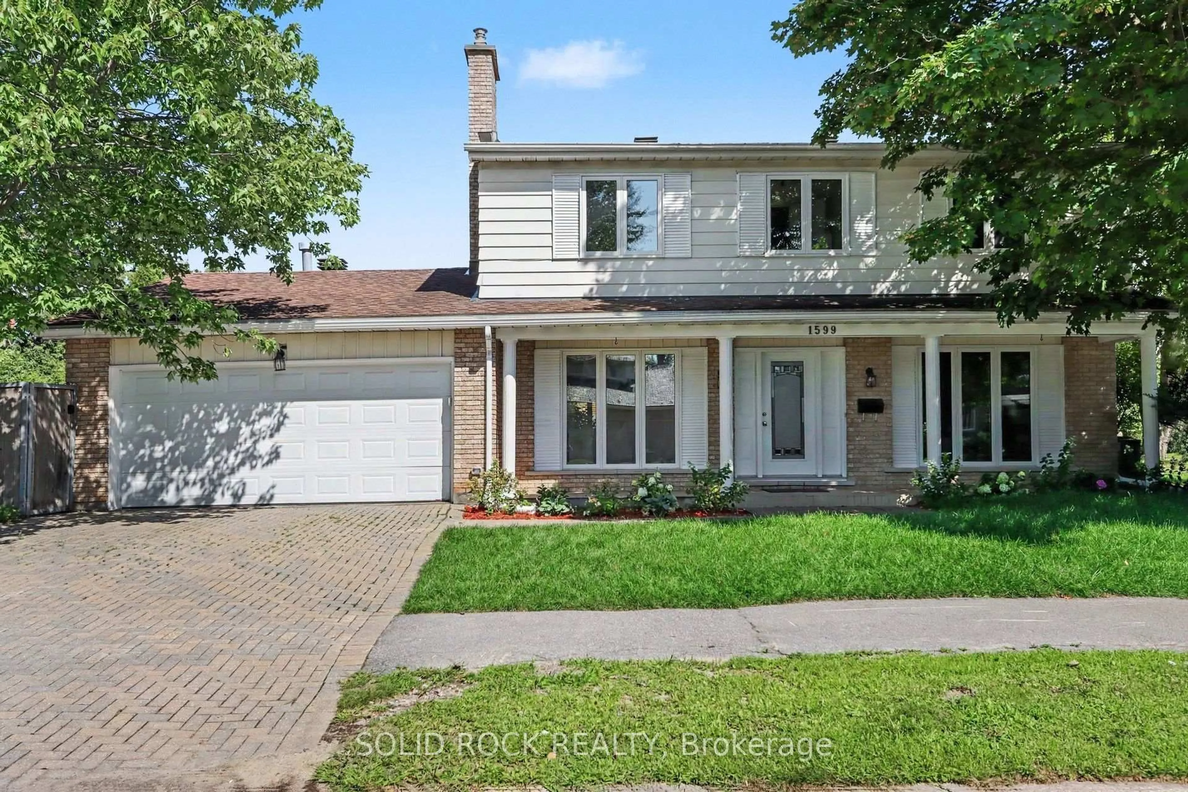 Home with brick exterior material, street for 1599 Featherston Dr, Ottawa Ontario K1H 6N9