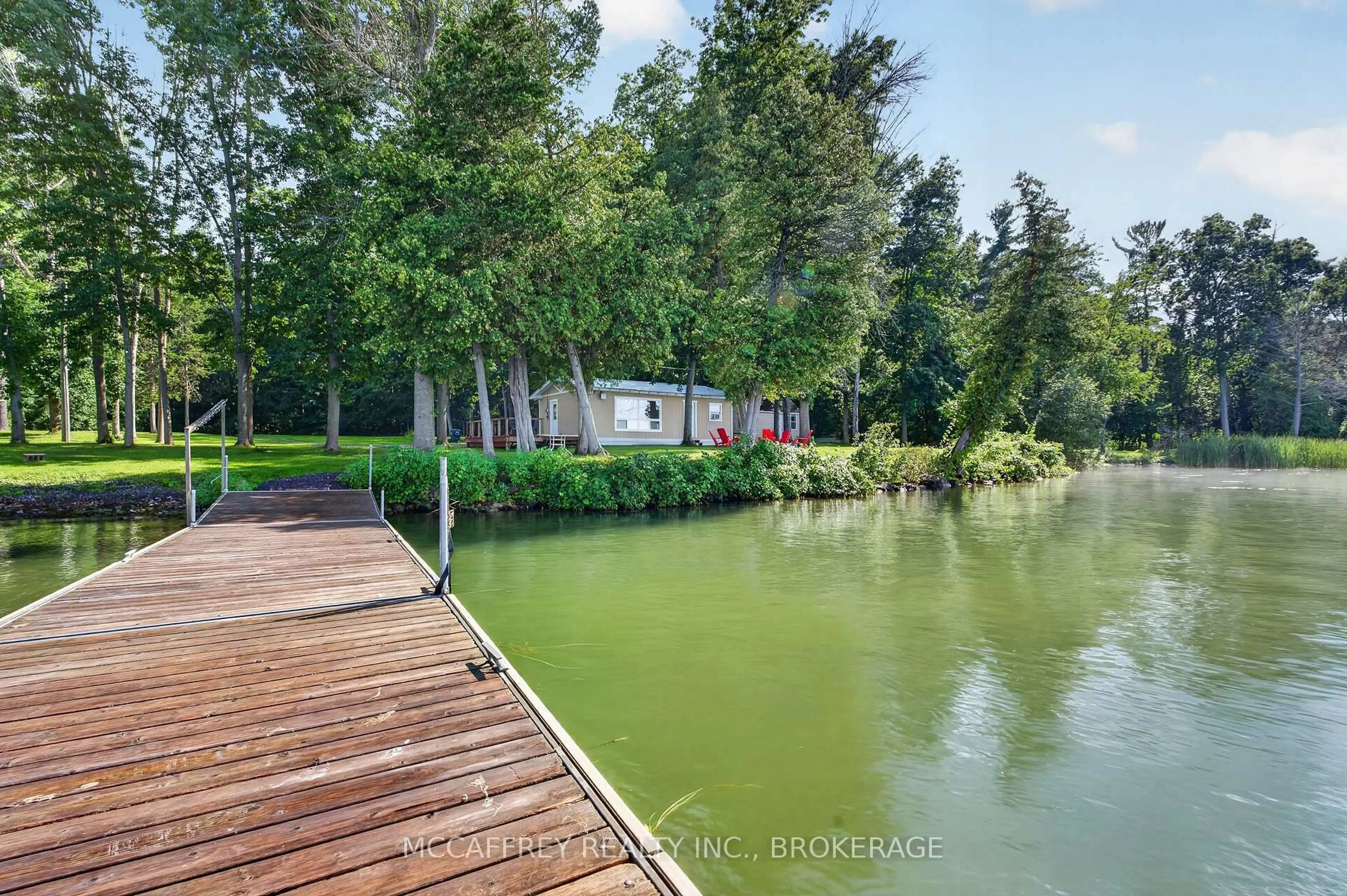 A pic from outside/outdoor area/front of a property/back of a property/a pic from drone, water/lake/river/ocean view for 80 Trillium Lane, Napanee Ontario K7R 3K7