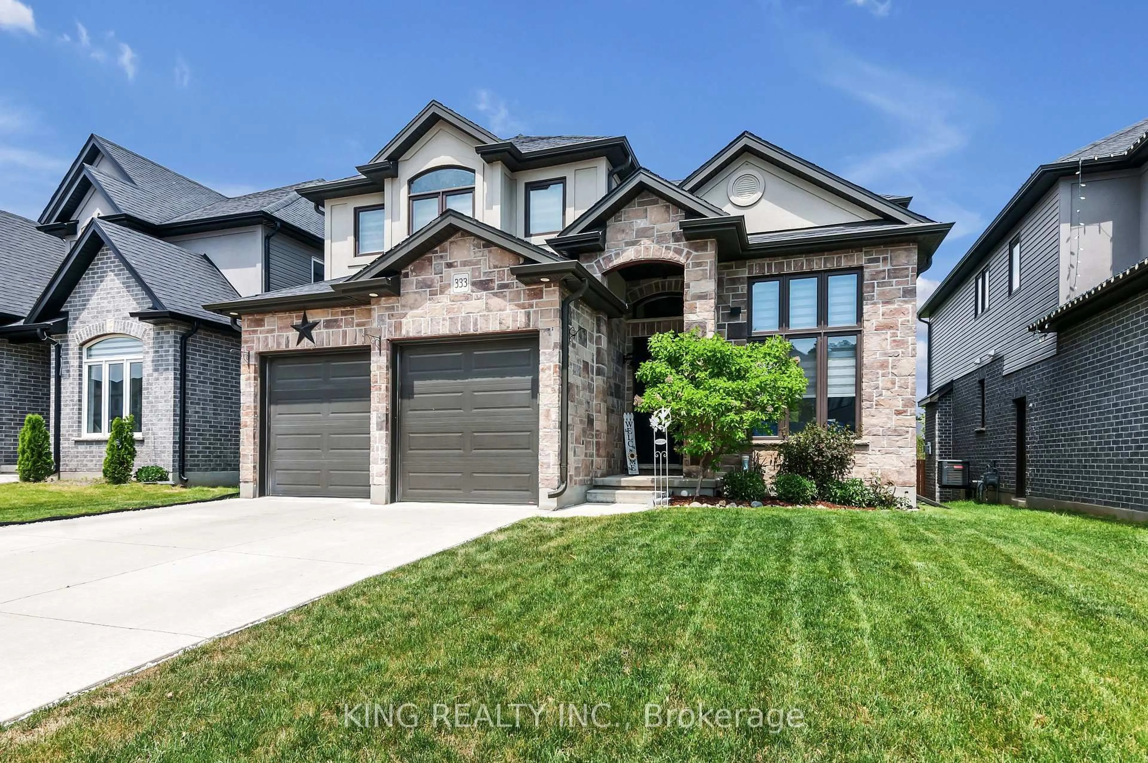 Home with brick exterior material, street for 333 MASTERS Dr, Woodstock Ontario N4T 0L2
