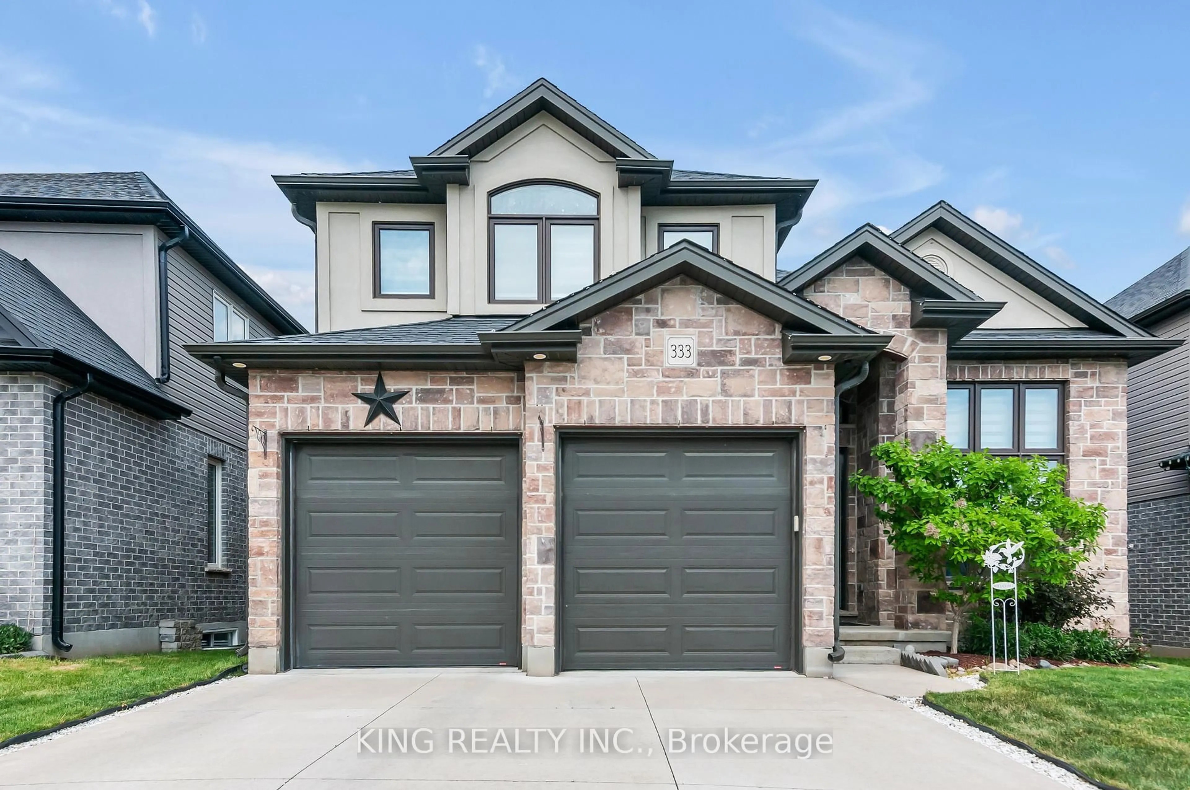 Home with brick exterior material, street for 333 MASTERS Dr, Woodstock Ontario N4T 0L2