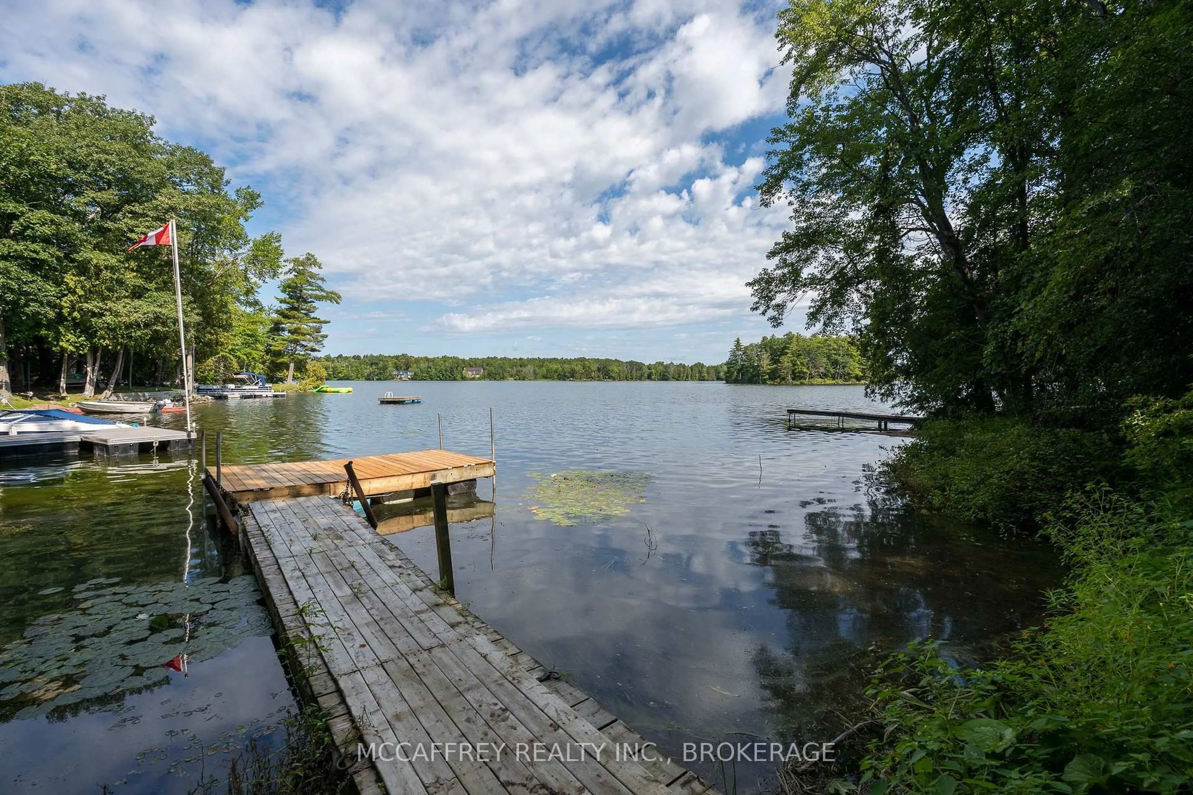 A pic from outside/outdoor area/front of a property/back of a property/a pic from drone, water/lake/river/ocean view for 3050 Ernie Lane, Battersea Ontario K0H 1H0