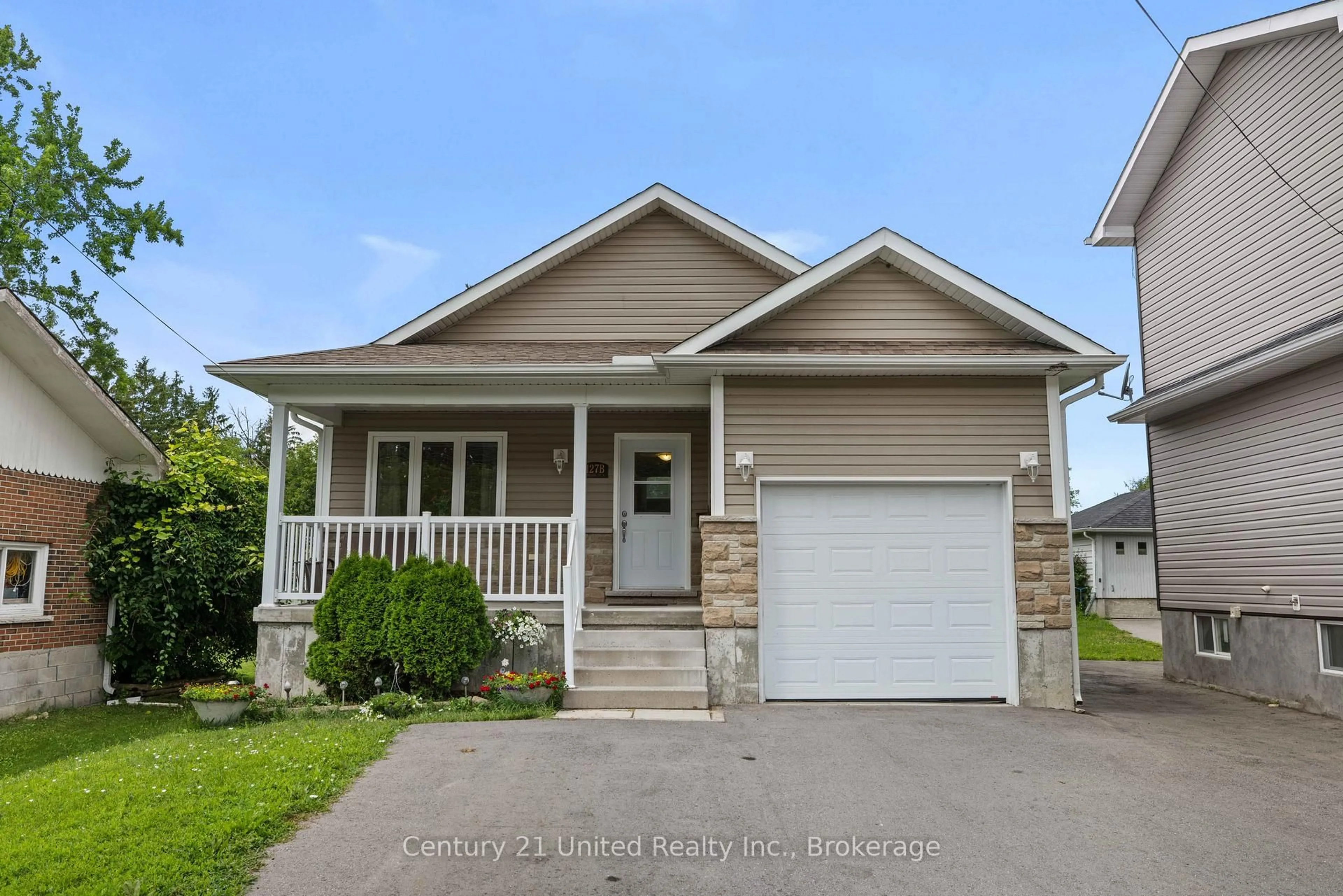 Home with vinyl exterior material, street for 127.5 Adelaide St, Kawartha Lakes Ontario K9V 3K5