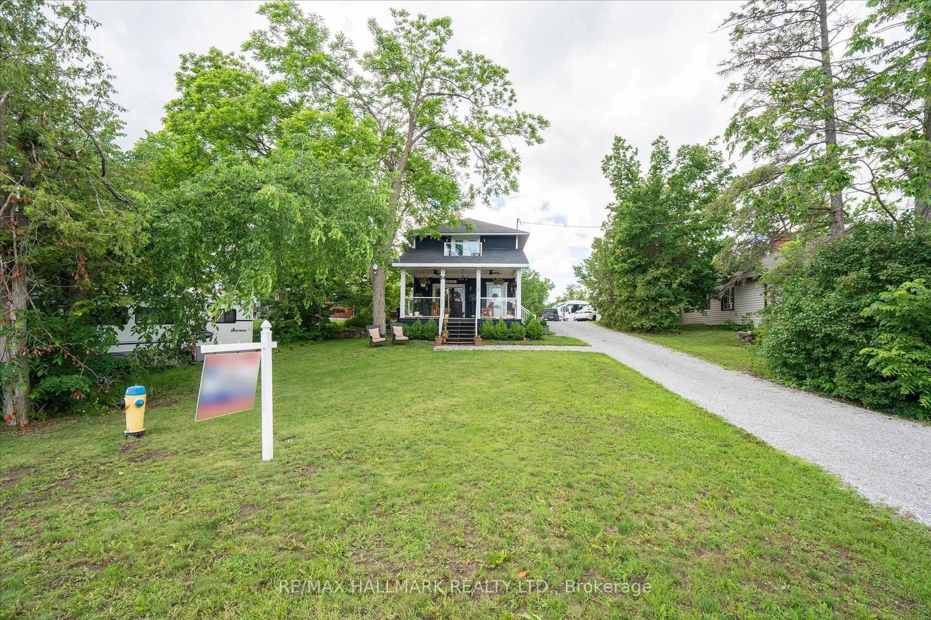 A pic from outside/outdoor area/front of a property/back of a property/a pic from drone, street for 64 Front St, Kawartha Lakes Ontario K0M 1A0