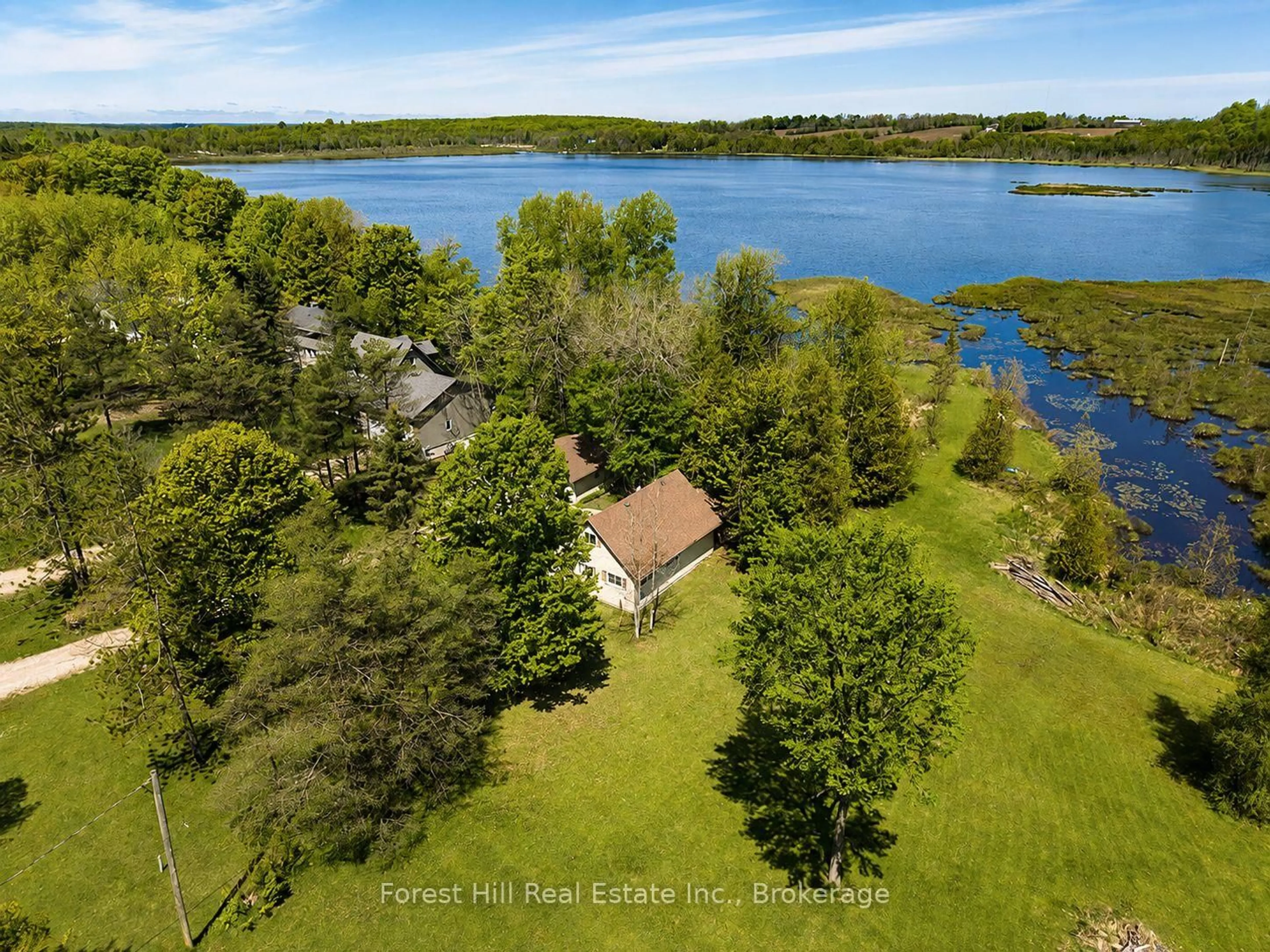 A pic from outside/outdoor area/front of a property/back of a property/a pic from drone, water/lake/river/ocean view for 523583 12 Concession, West Grey Ontario N0C 1H0