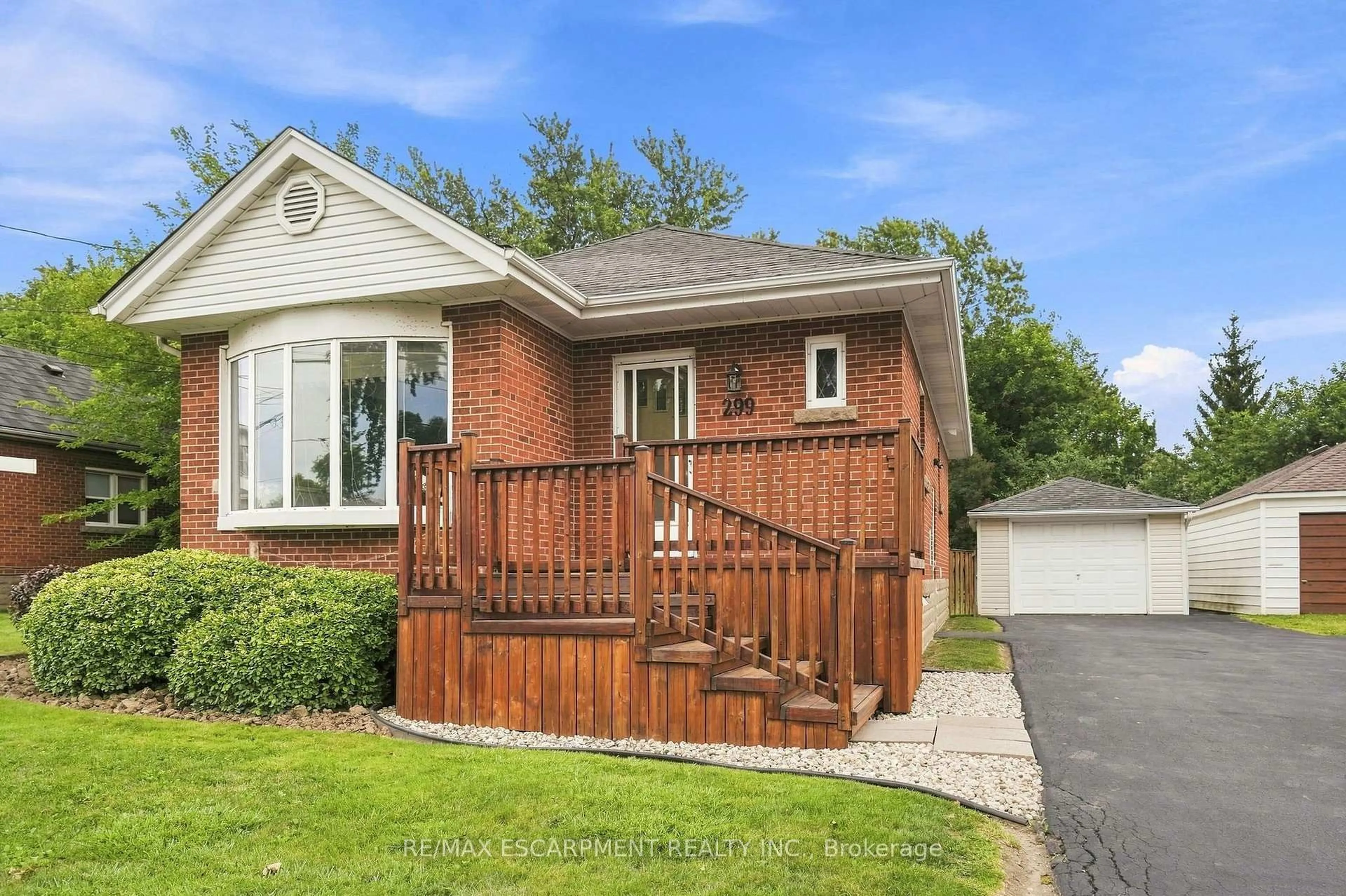 Home with brick exterior material, street for 299 West 5th St, Hamilton Ontario L9C 3P2
