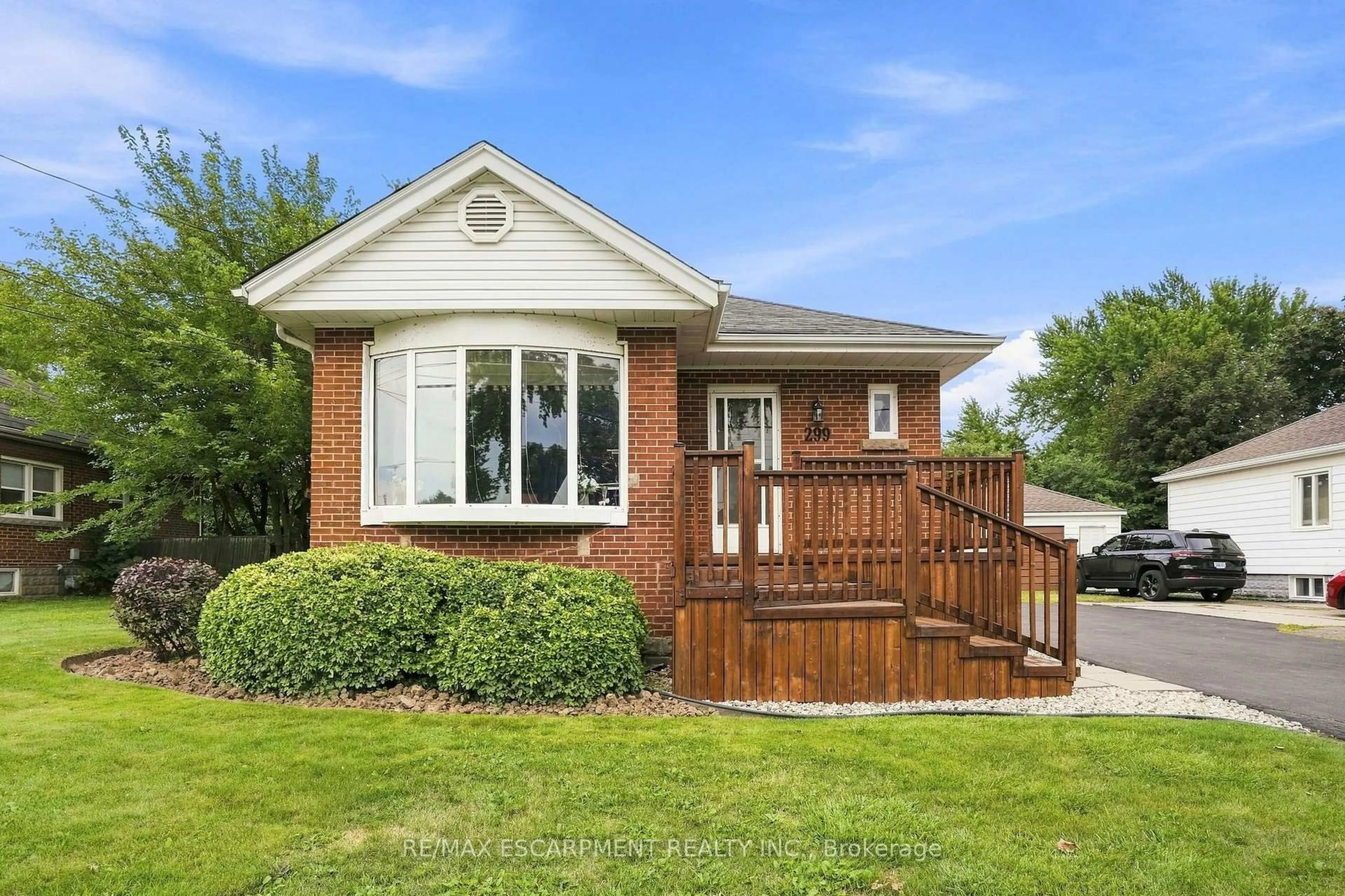 Home with brick exterior material, street for 299 West 5th St, Hamilton Ontario L9C 3P2