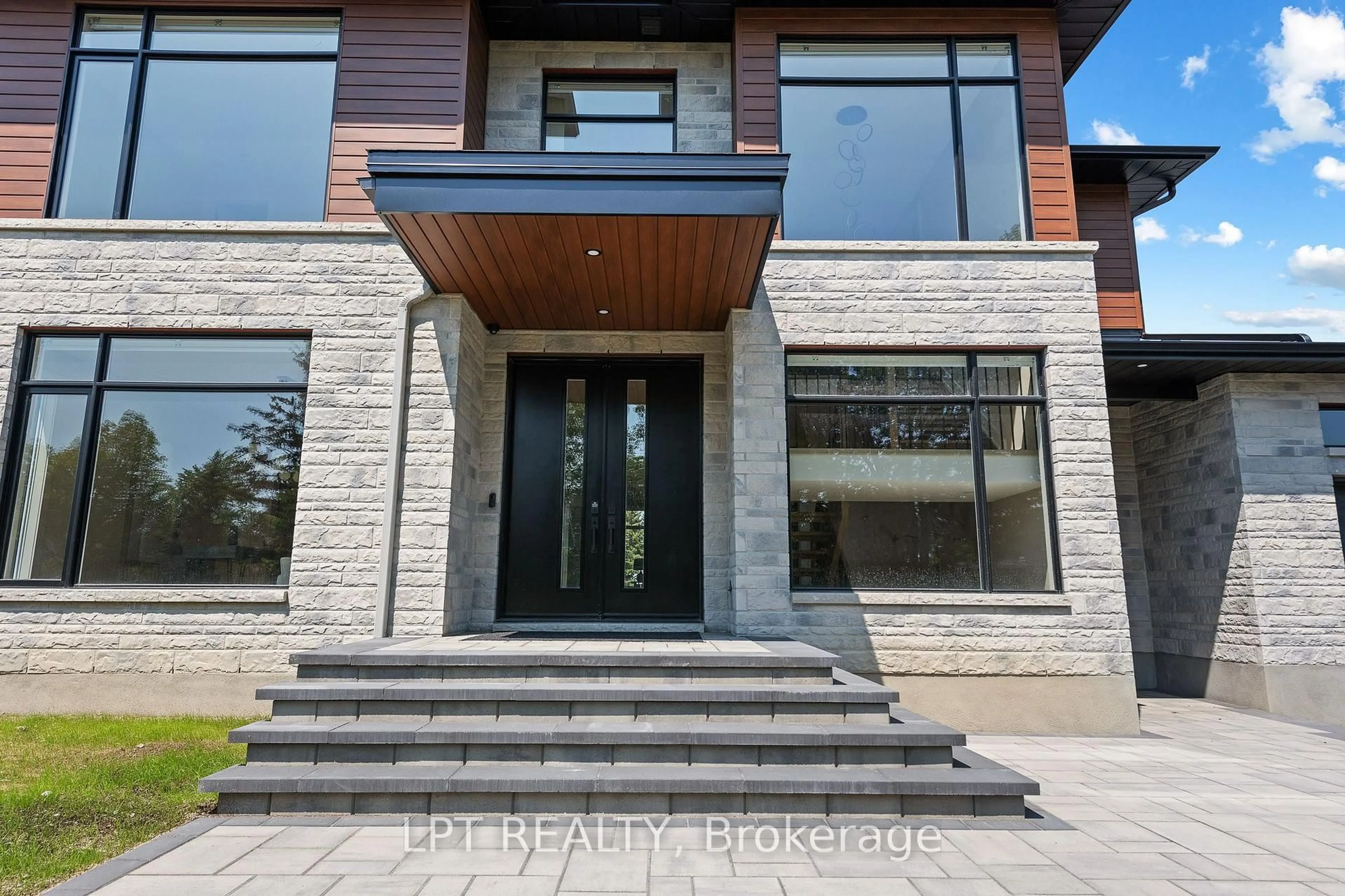 Home with brick exterior material, street for 15 Briggs Ave, Ottawa Ontario K2E 6W5