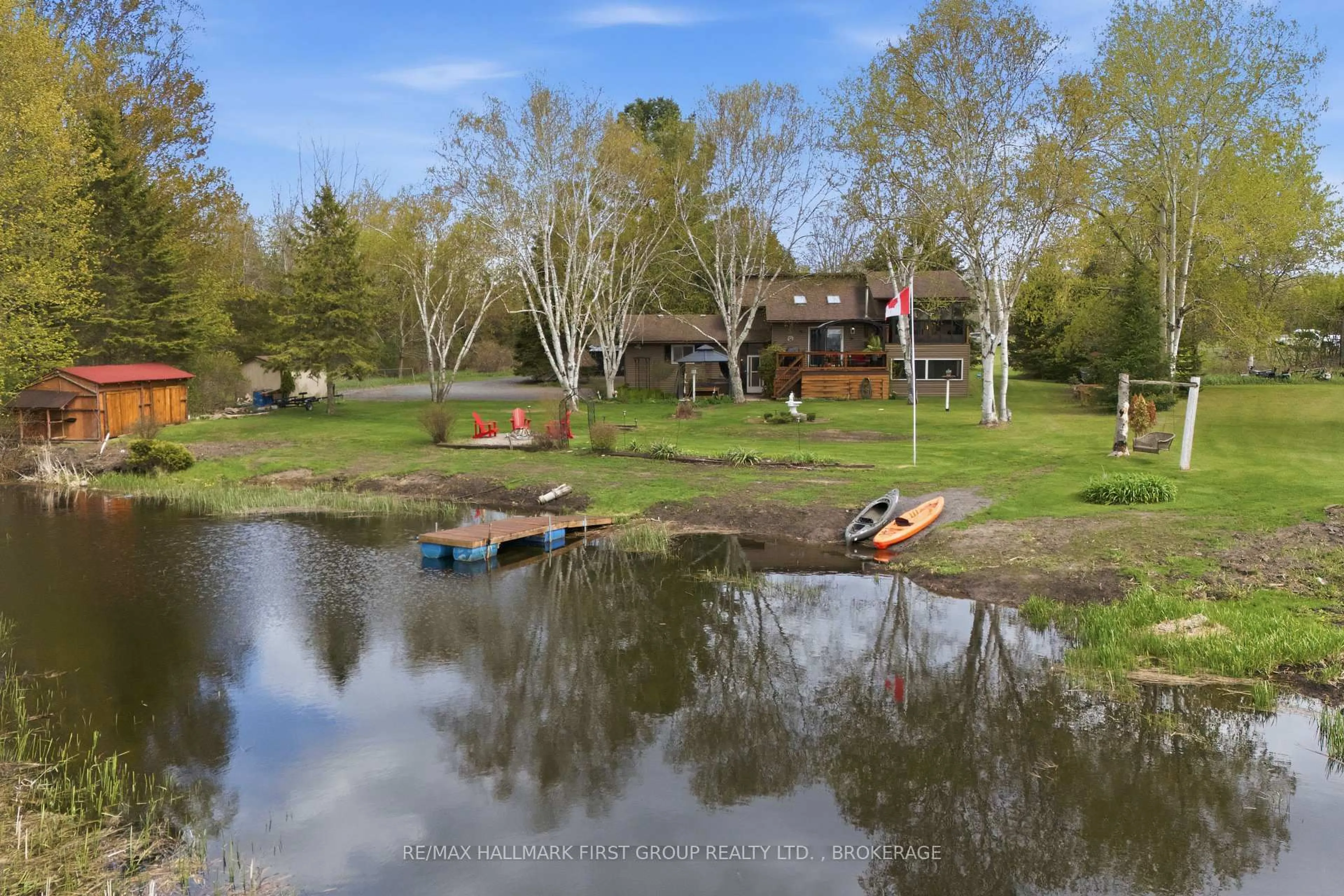A pic from outside/outdoor area/front of a property/back of a property/a pic from drone, water/lake/river/ocean view for 1851 County Rd 9 Rd, Napanee Ontario K7R 3K8