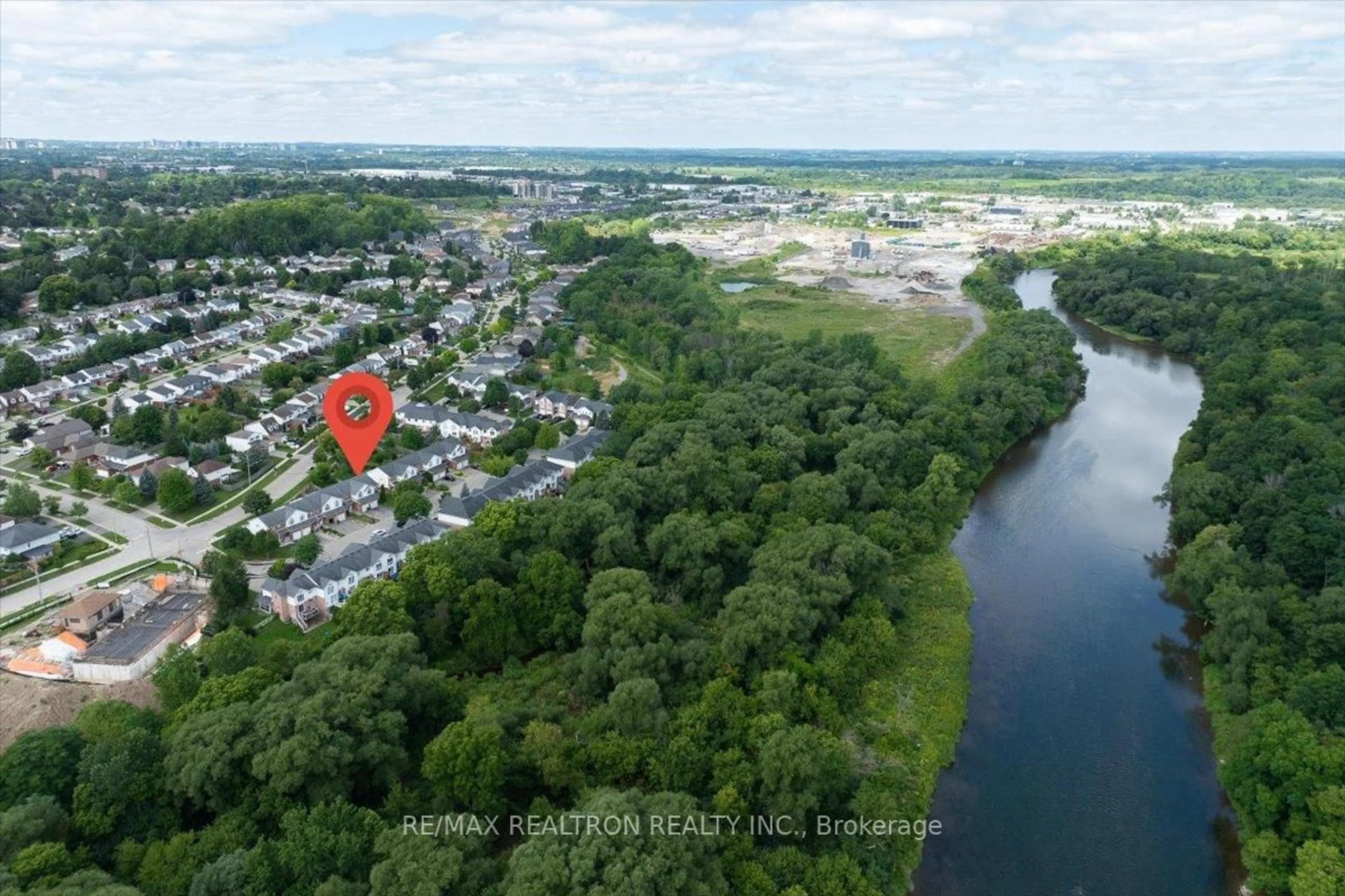 A pic from outside/outdoor area/front of a property/back of a property/a pic from drone, water/lake/river/ocean view for 21 Brandy Cres, Kitchener Ontario N2B 3W8