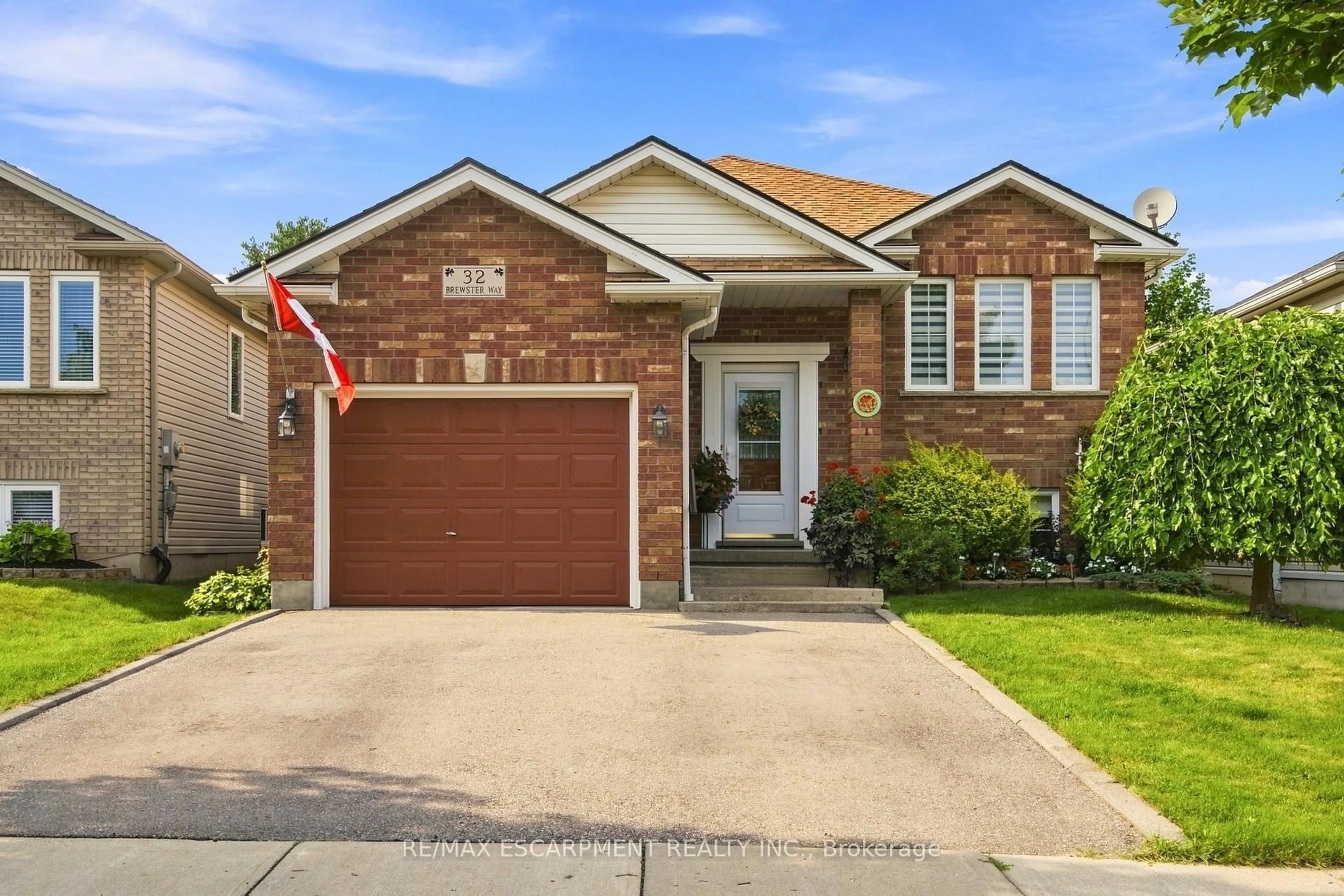 Home with brick exterior material, street for 32 Brewster Way, Brantford Ontario N3T 6N4