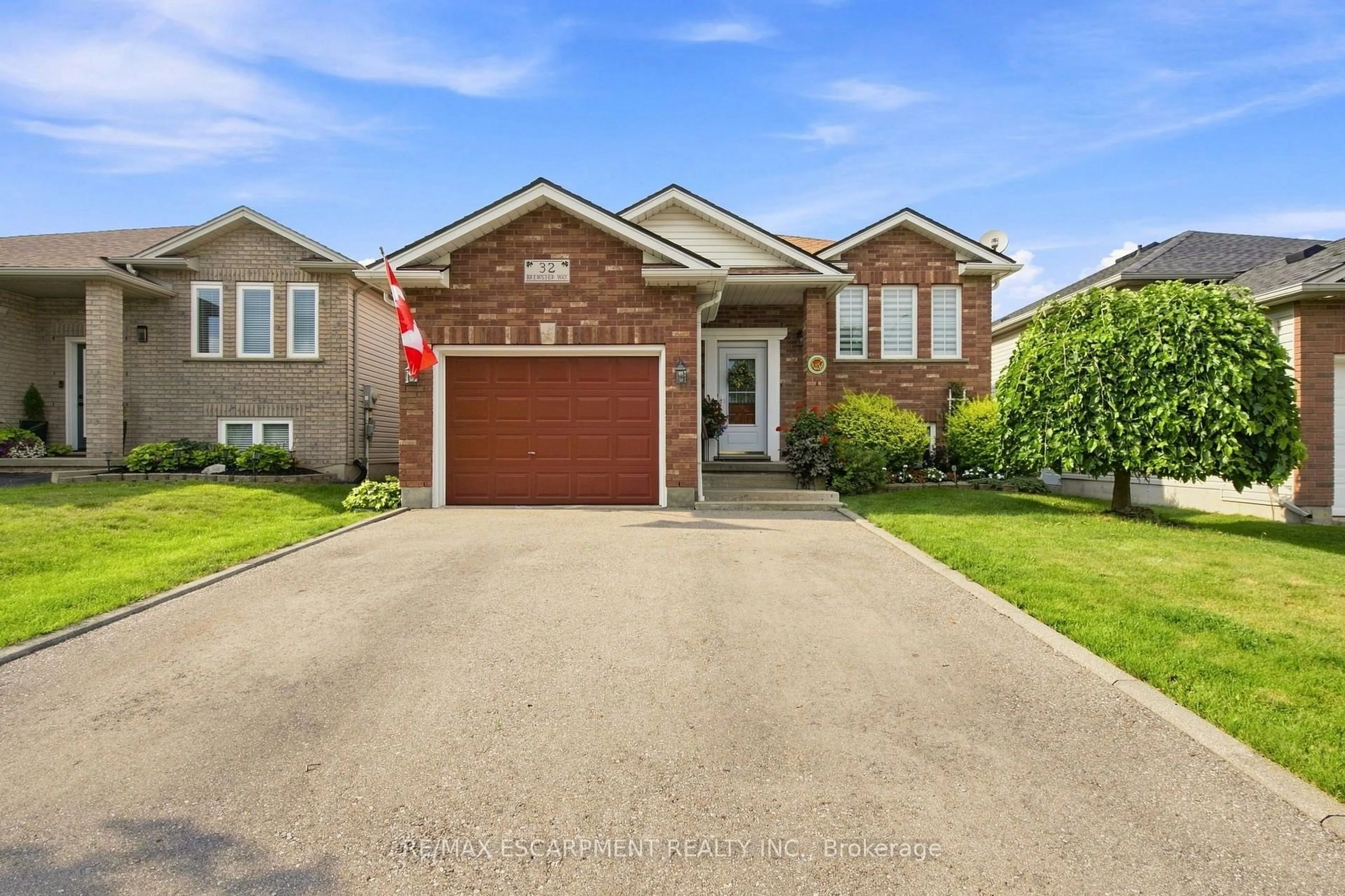 Home with brick exterior material, street for 32 Brewster Way, Brantford Ontario N3T 6N4