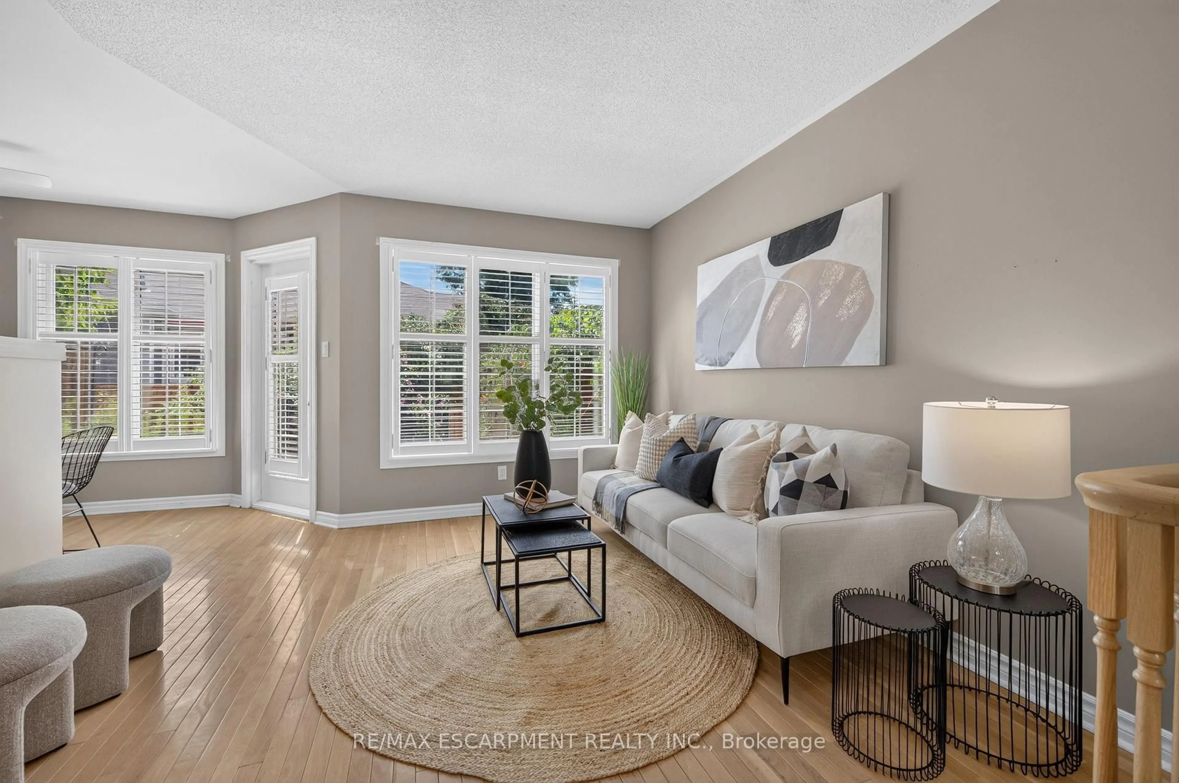 Living room with furniture, unknown for 175 Fiddlers Green Rd #9, Hamilton Ontario L9G 4X7