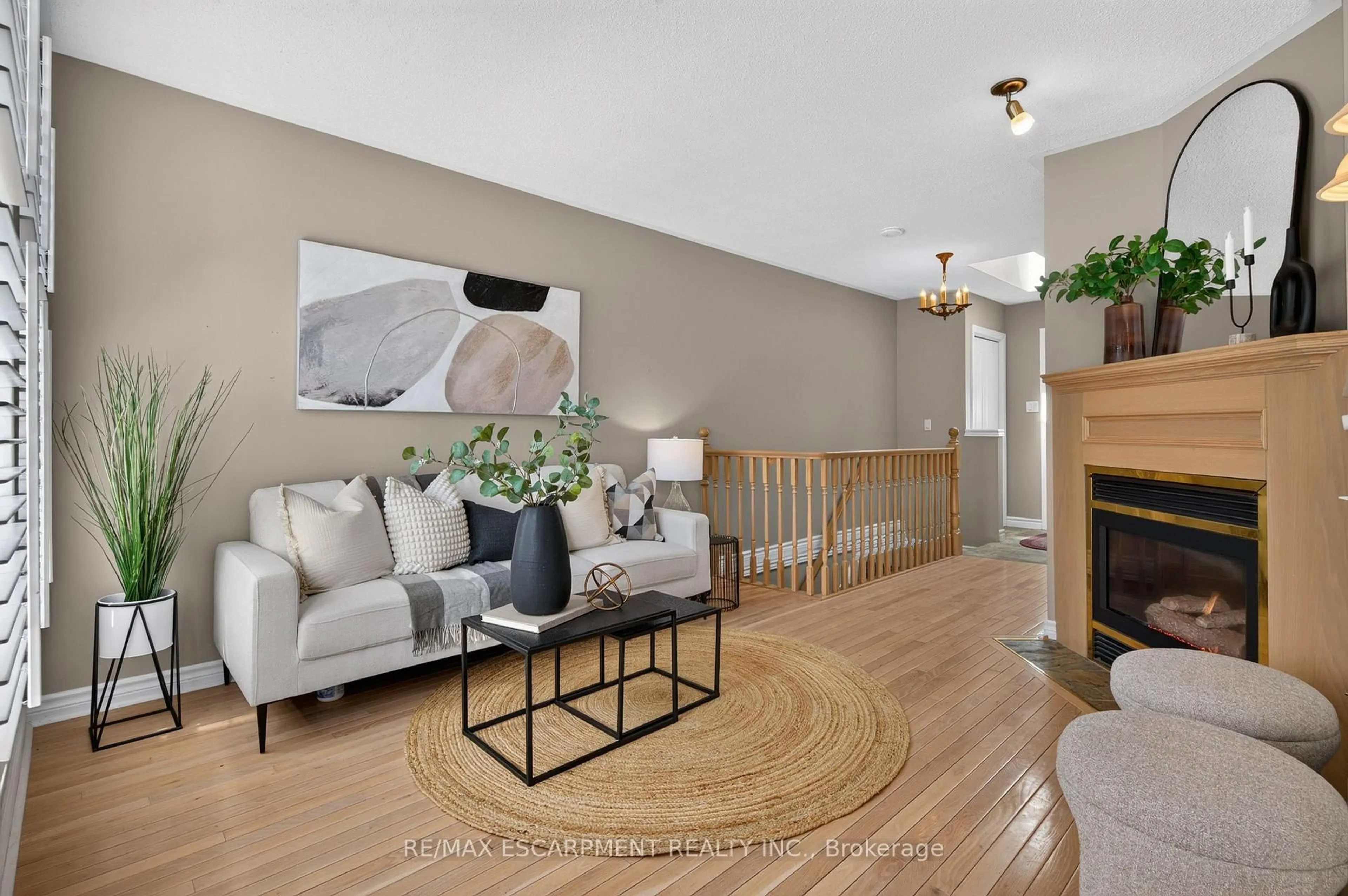 Living room with furniture, unknown for 175 Fiddlers Green Rd #9, Hamilton Ontario L9G 4X7