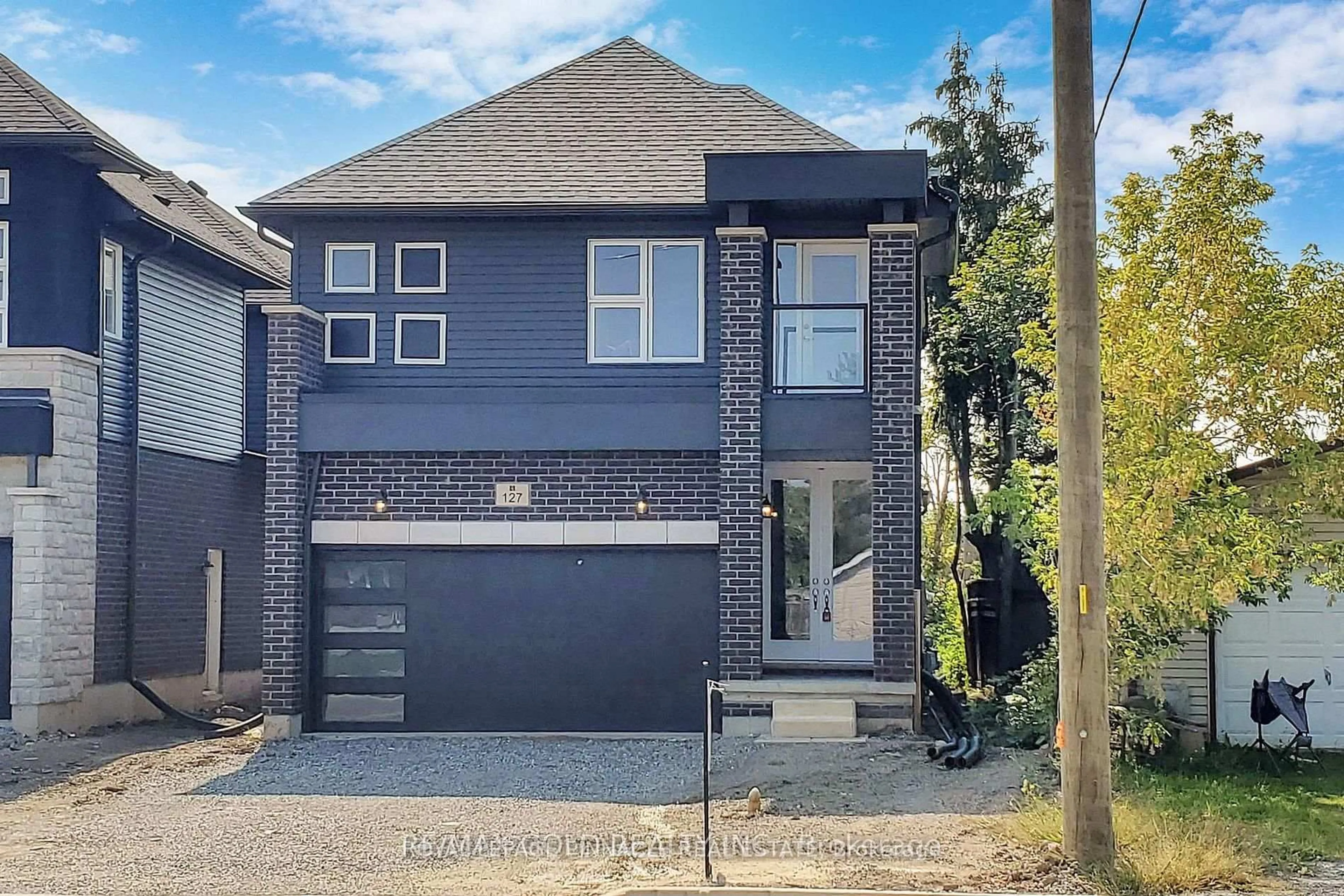 Home with brick exterior material, street for 127 Laugher Ave, Welland Ontario L3B 0N6