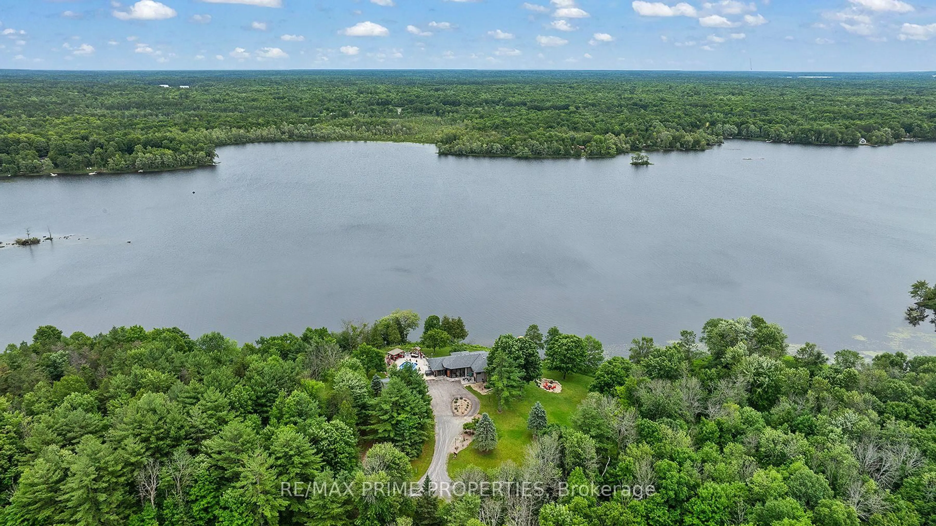 A pic from outside/outdoor area/front of a property/back of a property/a pic from drone, water/lake/river/ocean view for 120 Black Lake Rte, Perth Ontario K7H 3C5