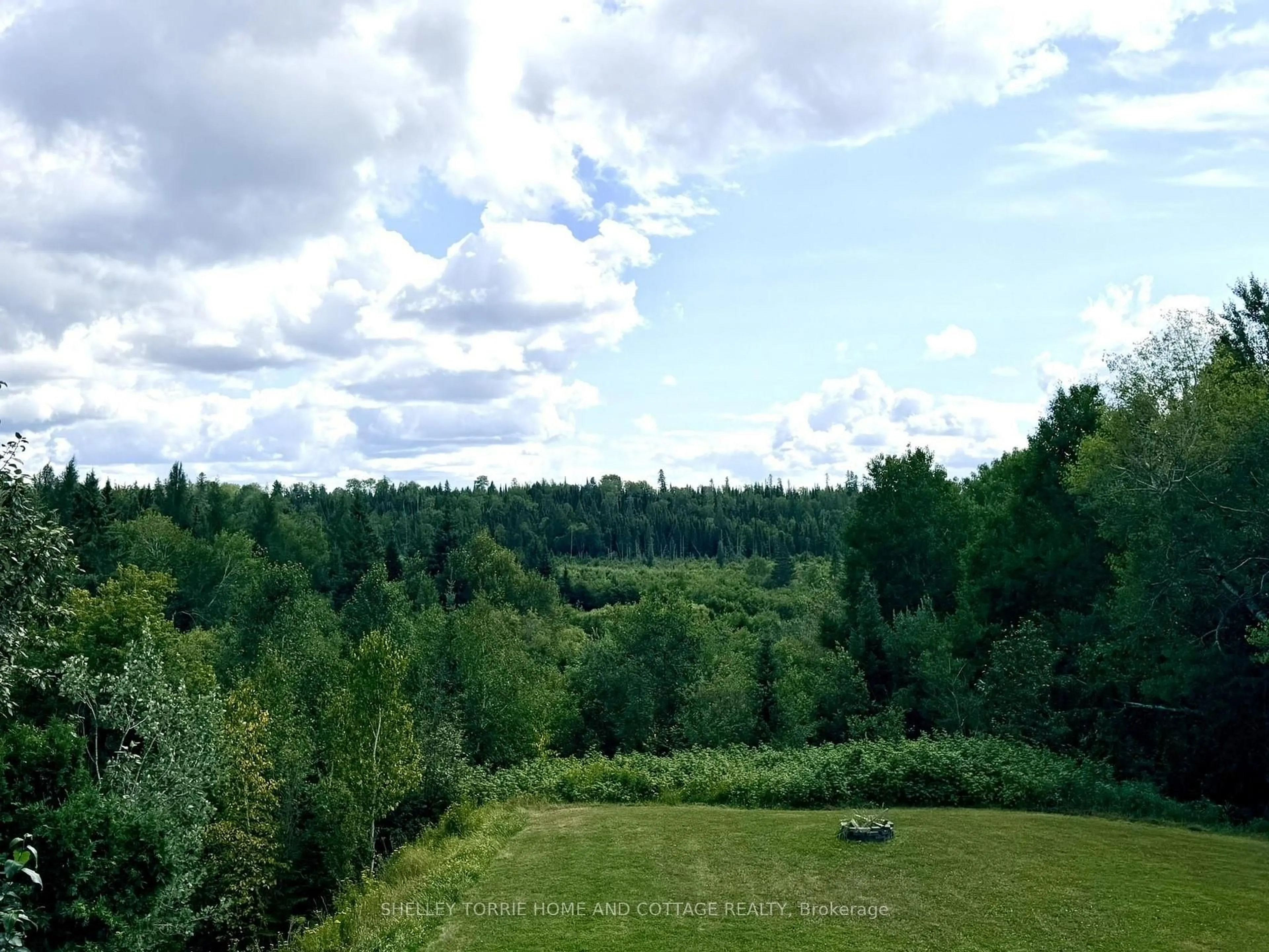 A pic from outside/outdoor area/front of a property/back of a property/a pic from drone, forest/trees view for 59 Donbrock Dr, Kenora Ontario P9N 0A2
